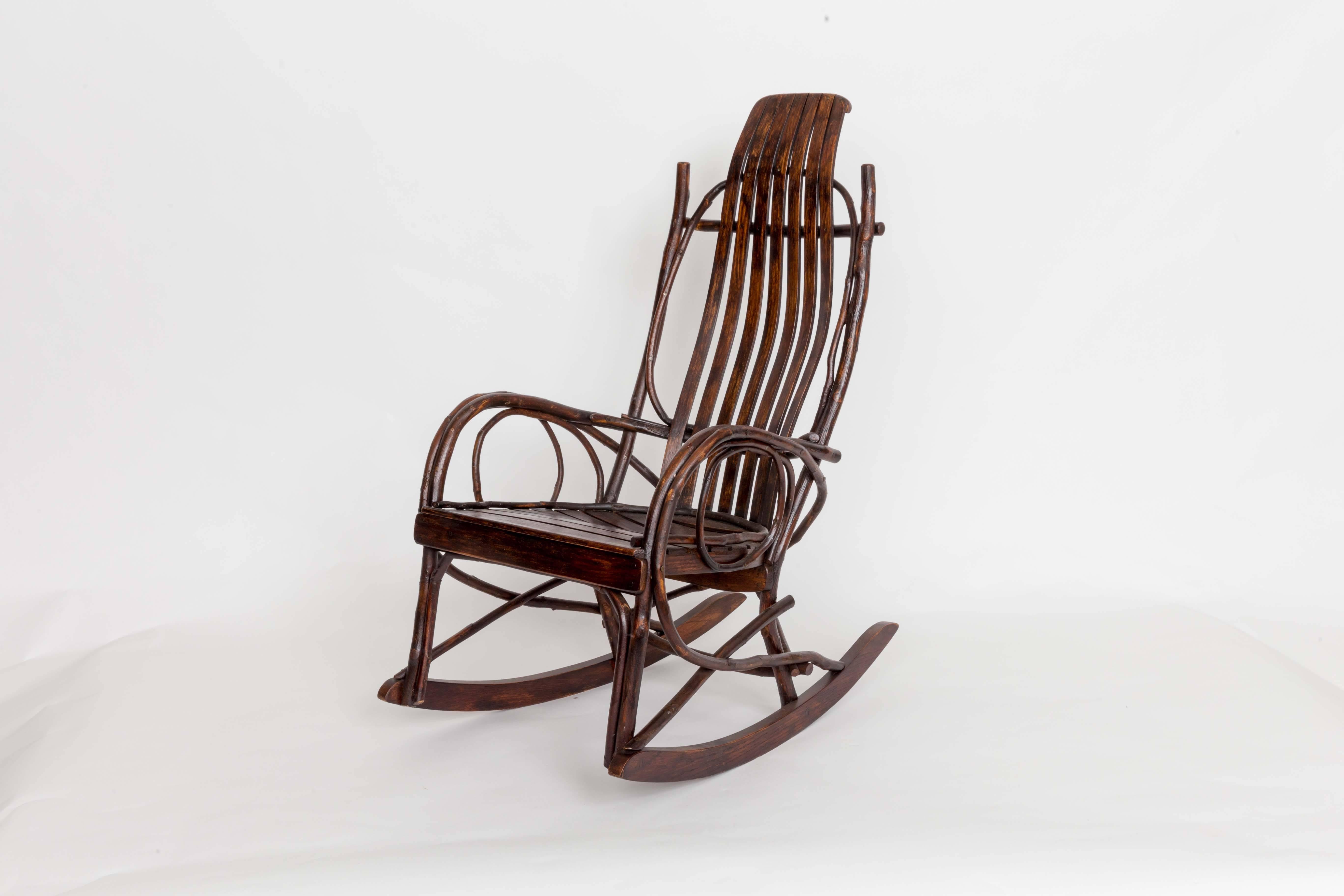 Early 20th-century Adirondack Childs rocking chair.