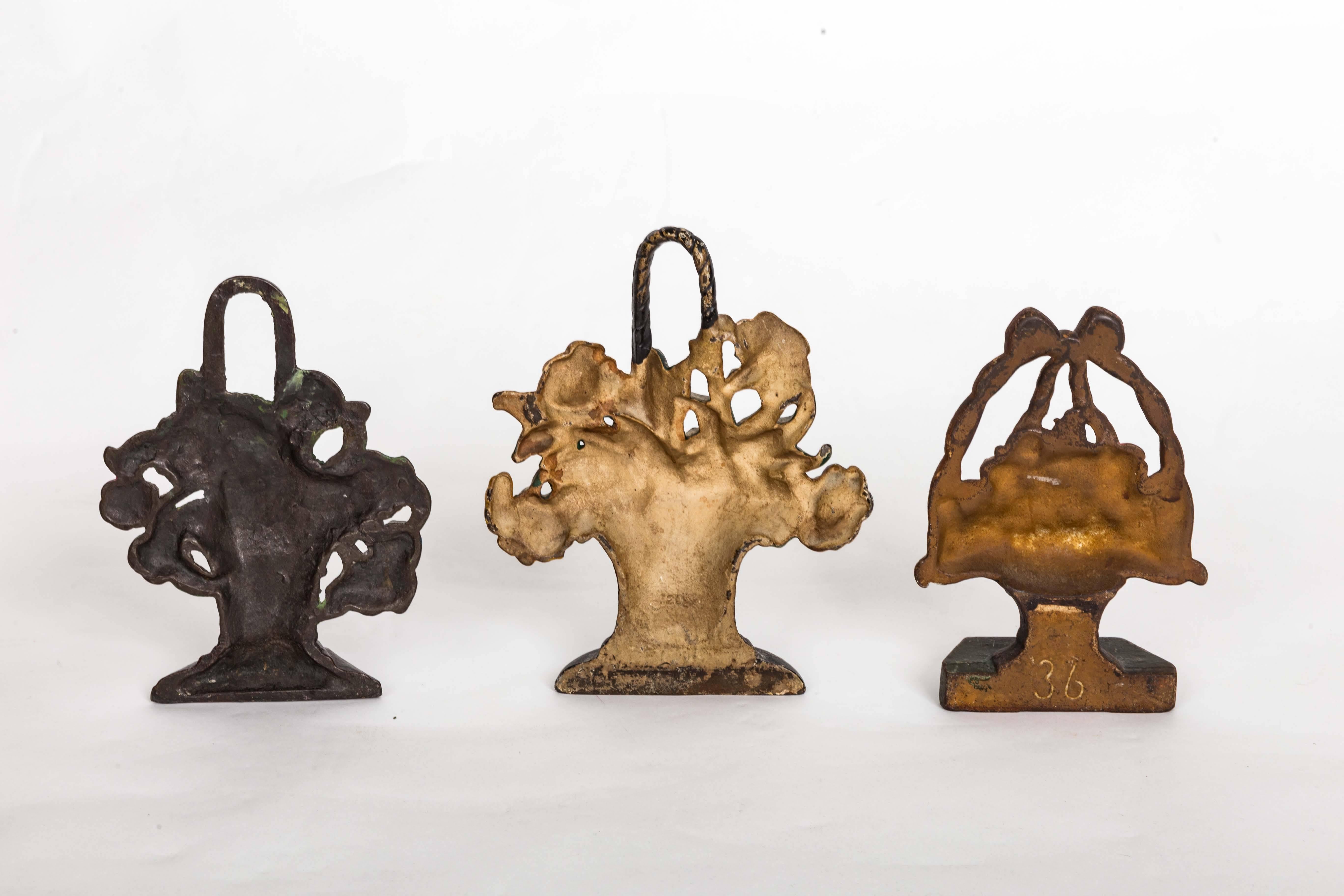Group of Five Early 20th Century Painted Cast Iron Doorstops 4