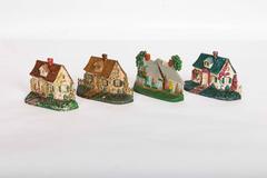 Group of Four Painted Cast Iron Doorstops