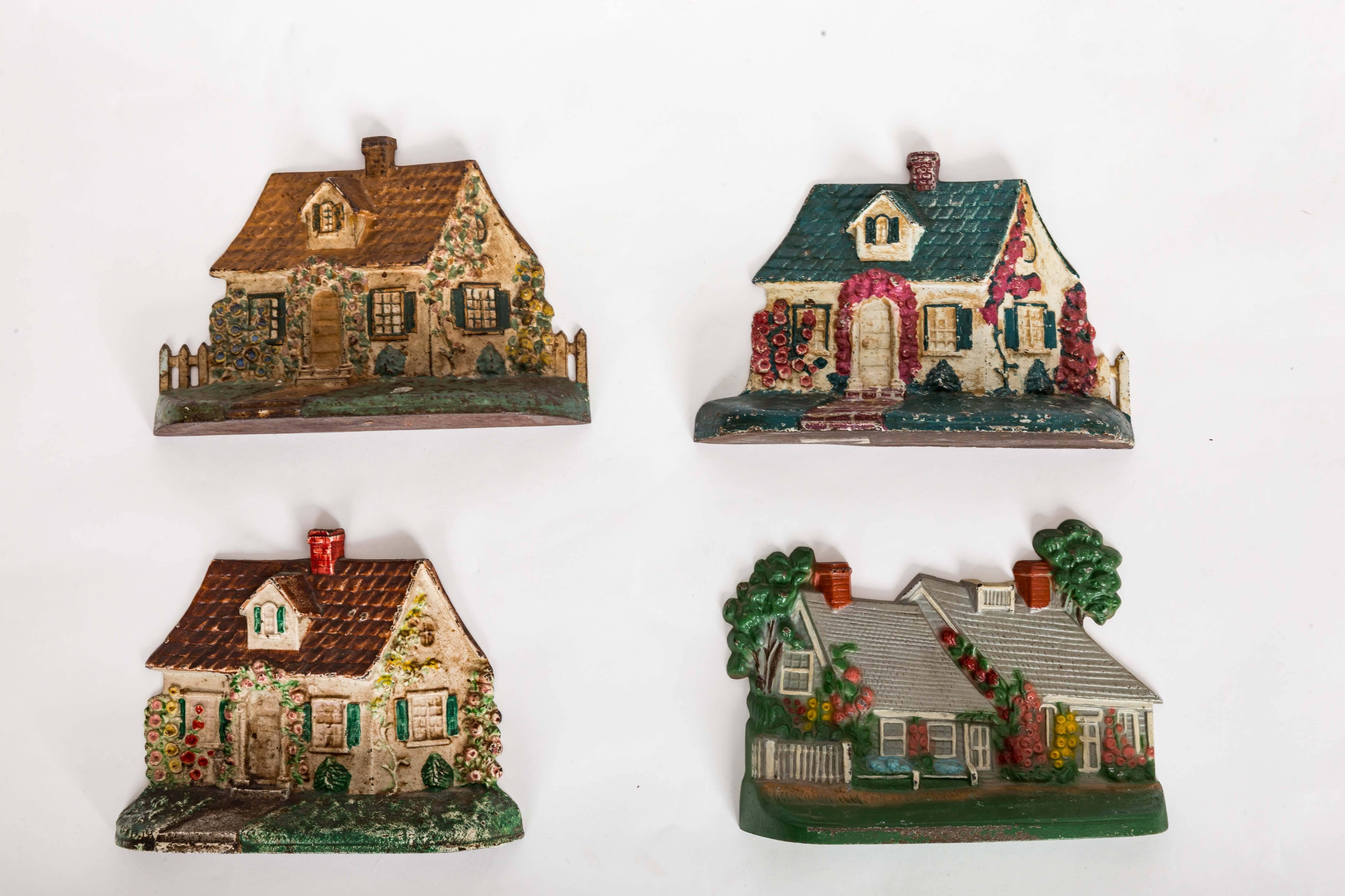 20th Century Group of Four Painted Cast Iron Doorstops For Sale