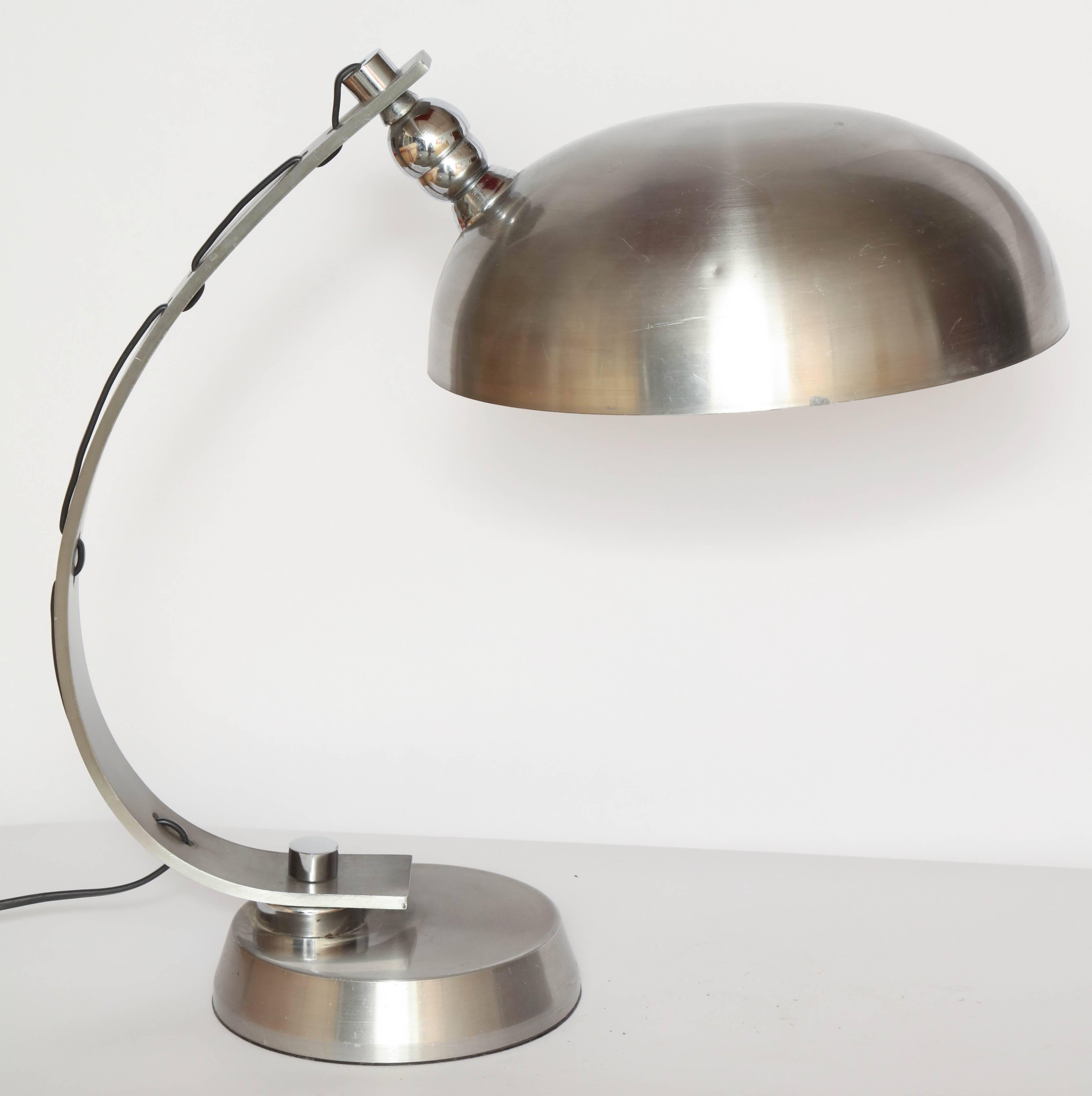 Articulated table lamp, Italy 1970s, brushed aluminum.