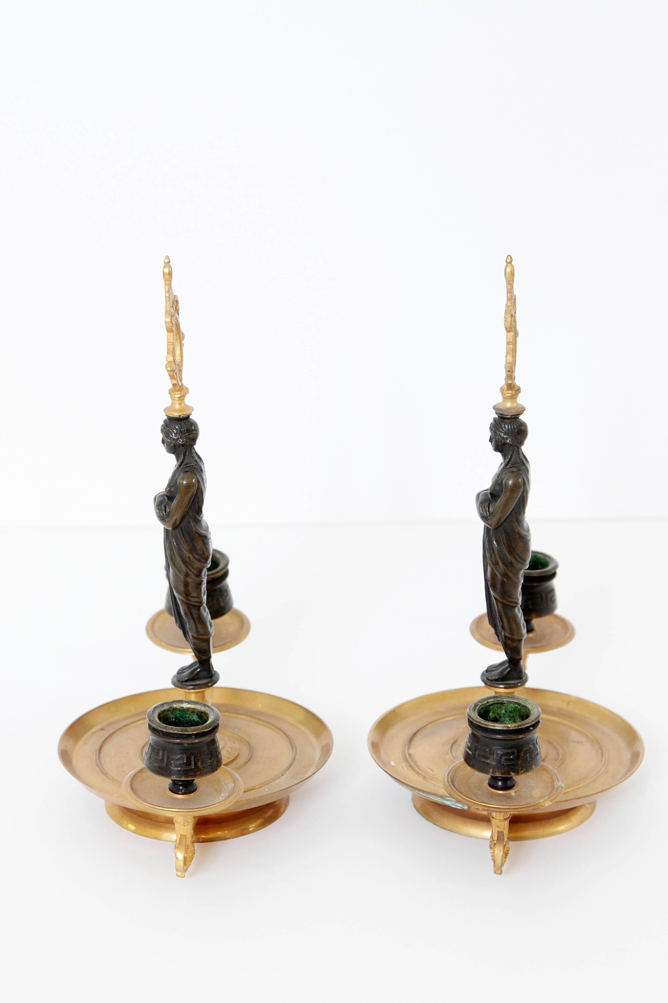 Pair of Patinated and Gilt Bronze Figural Candelabra In Excellent Condition For Sale In Dallas, TX