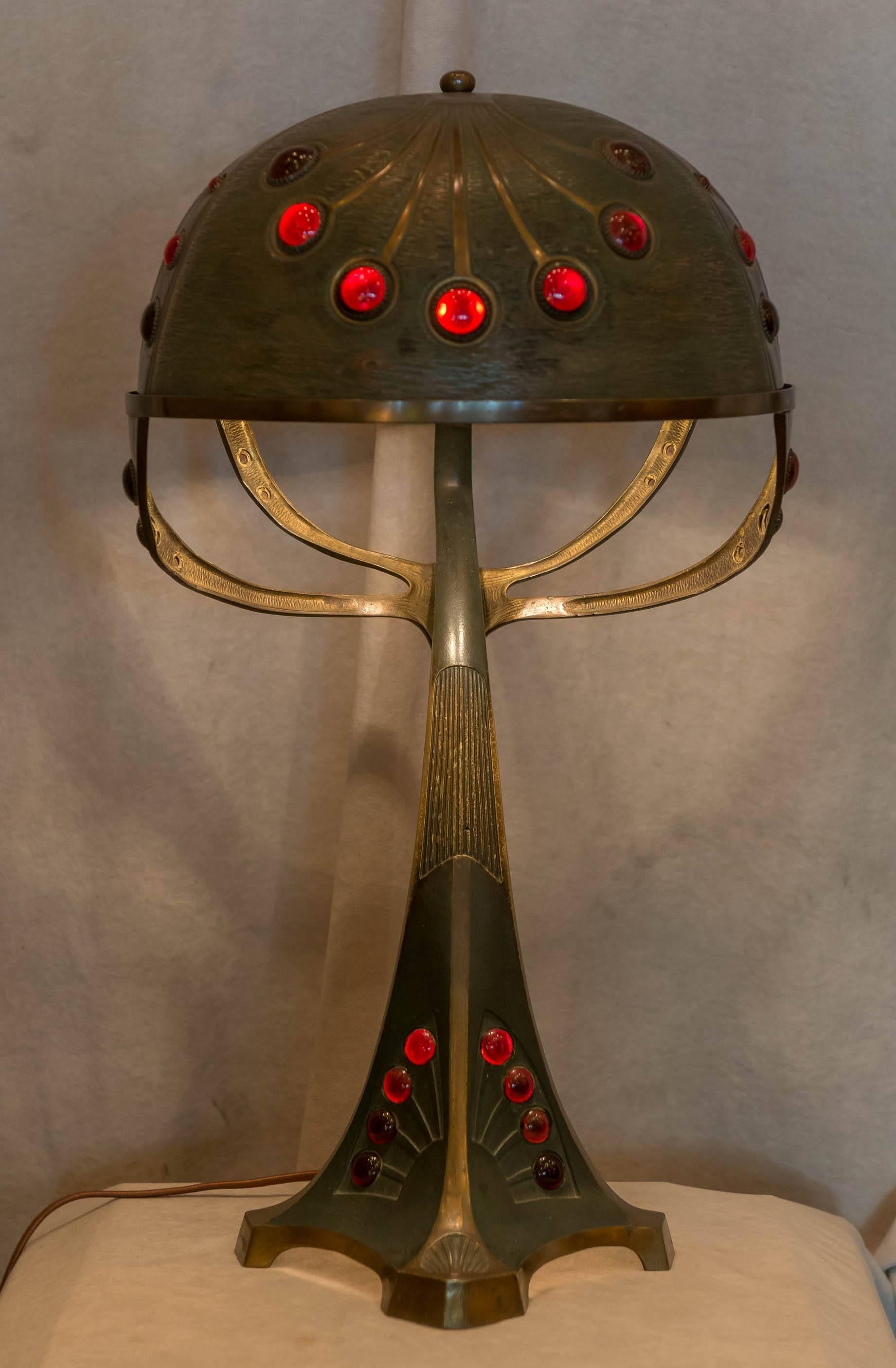 This is one of the reasons we try to fill our shop with Austrian lighting and sculpture. This lamp has that look that we covet. Well designed and imagination went into the creation of this lamp. Rich patina and great condition all add to it's