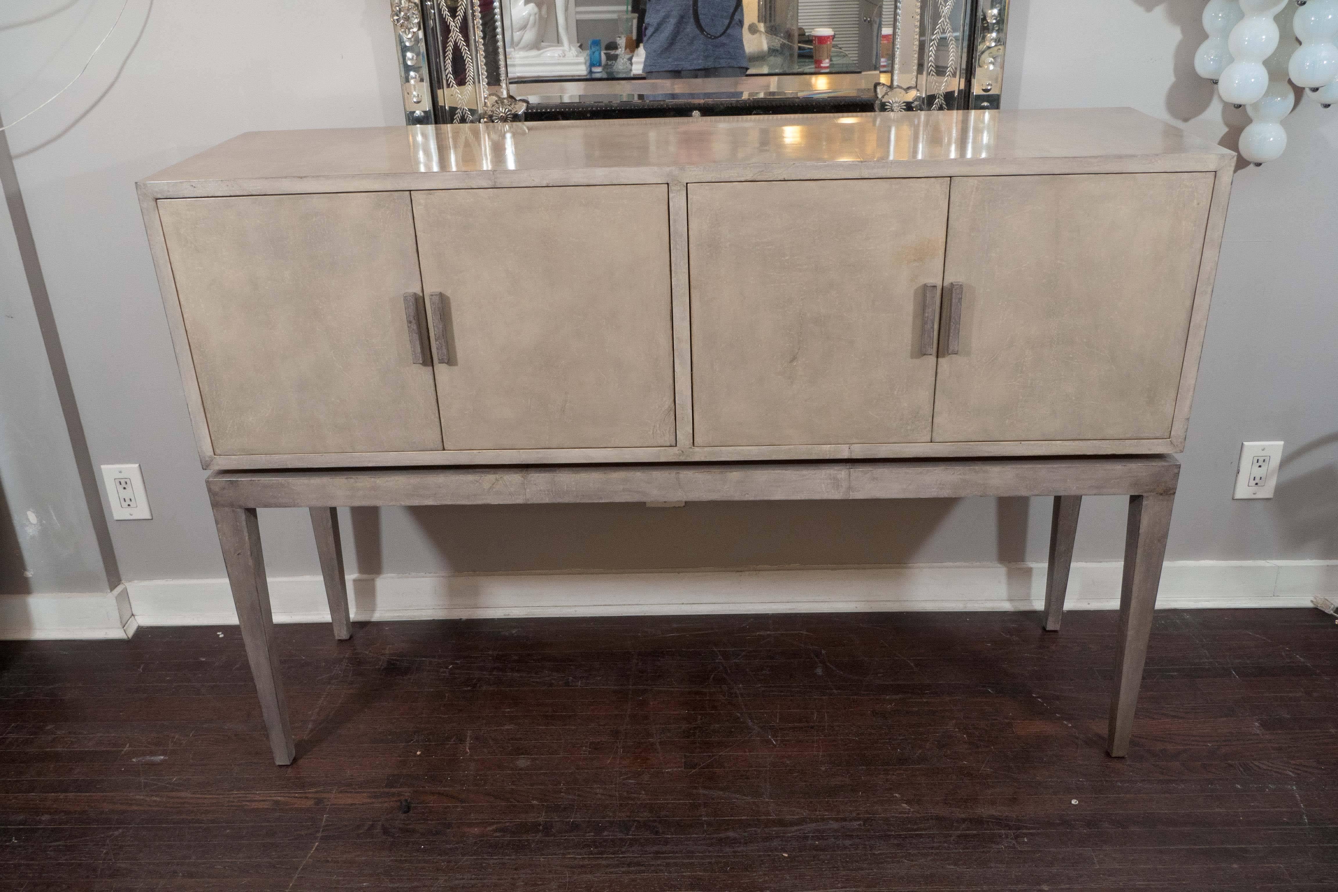 Custom two-toned gray stained parchment bar with Sycamore interior.