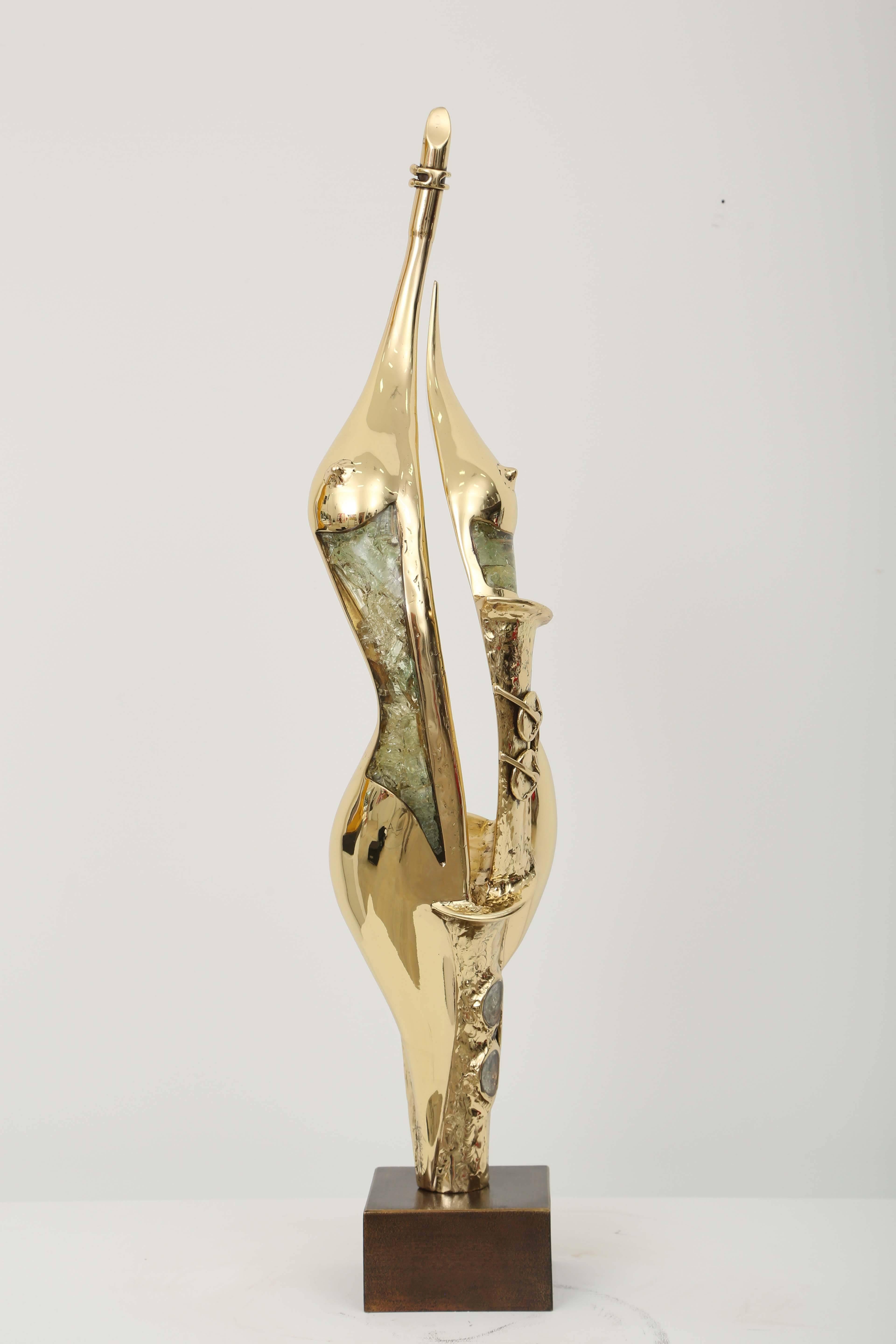 Stylised body, close to abstraction for this gilded with inlaid glass bronze sculpture, by the French Sculptor J. Duval Brasseur.
Mid-Century work of art.
Signed unique piece, elegant design,
certificate of authenticity.
 