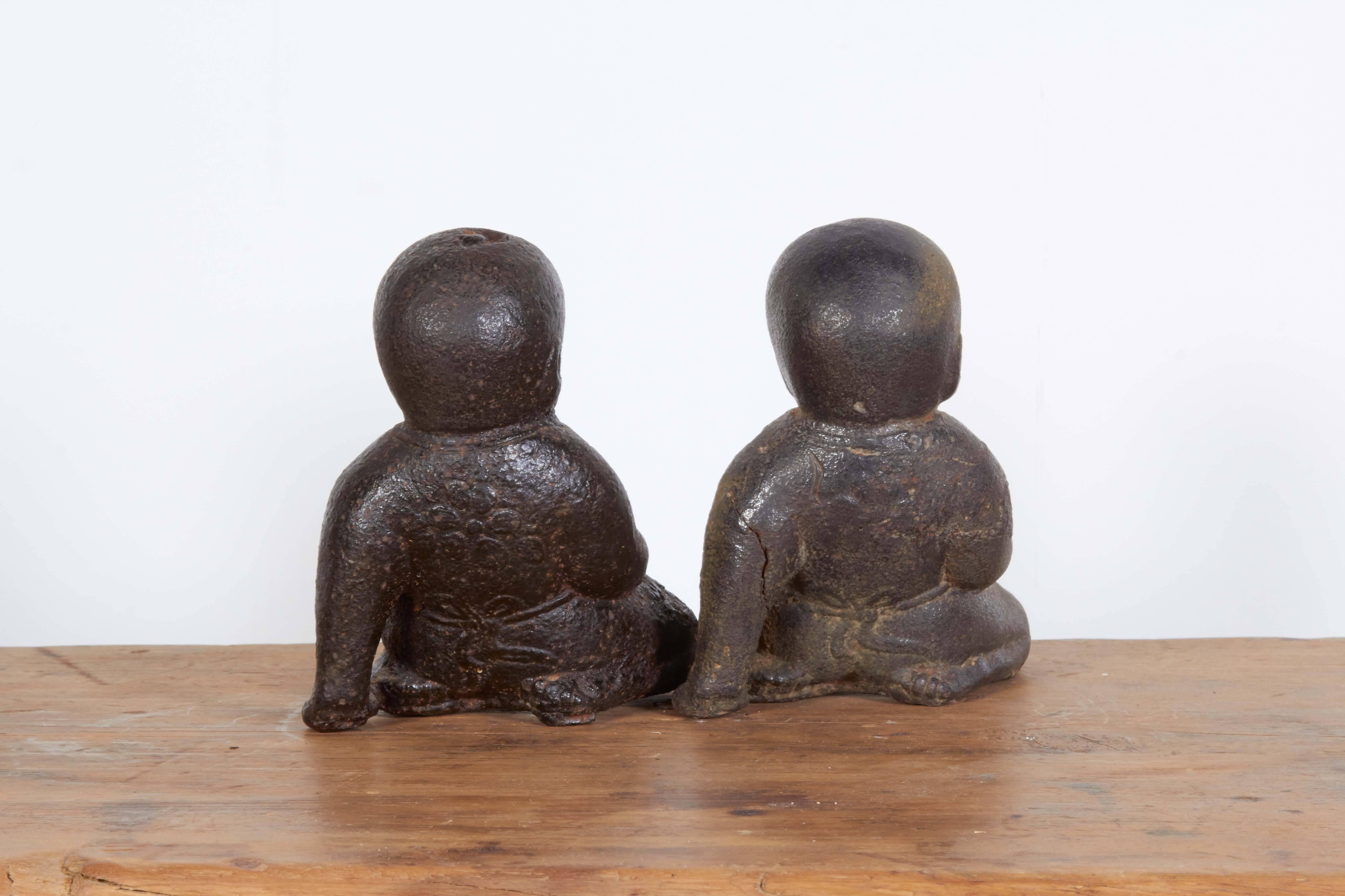 Pair of Adorable Cast Iron Babies 1