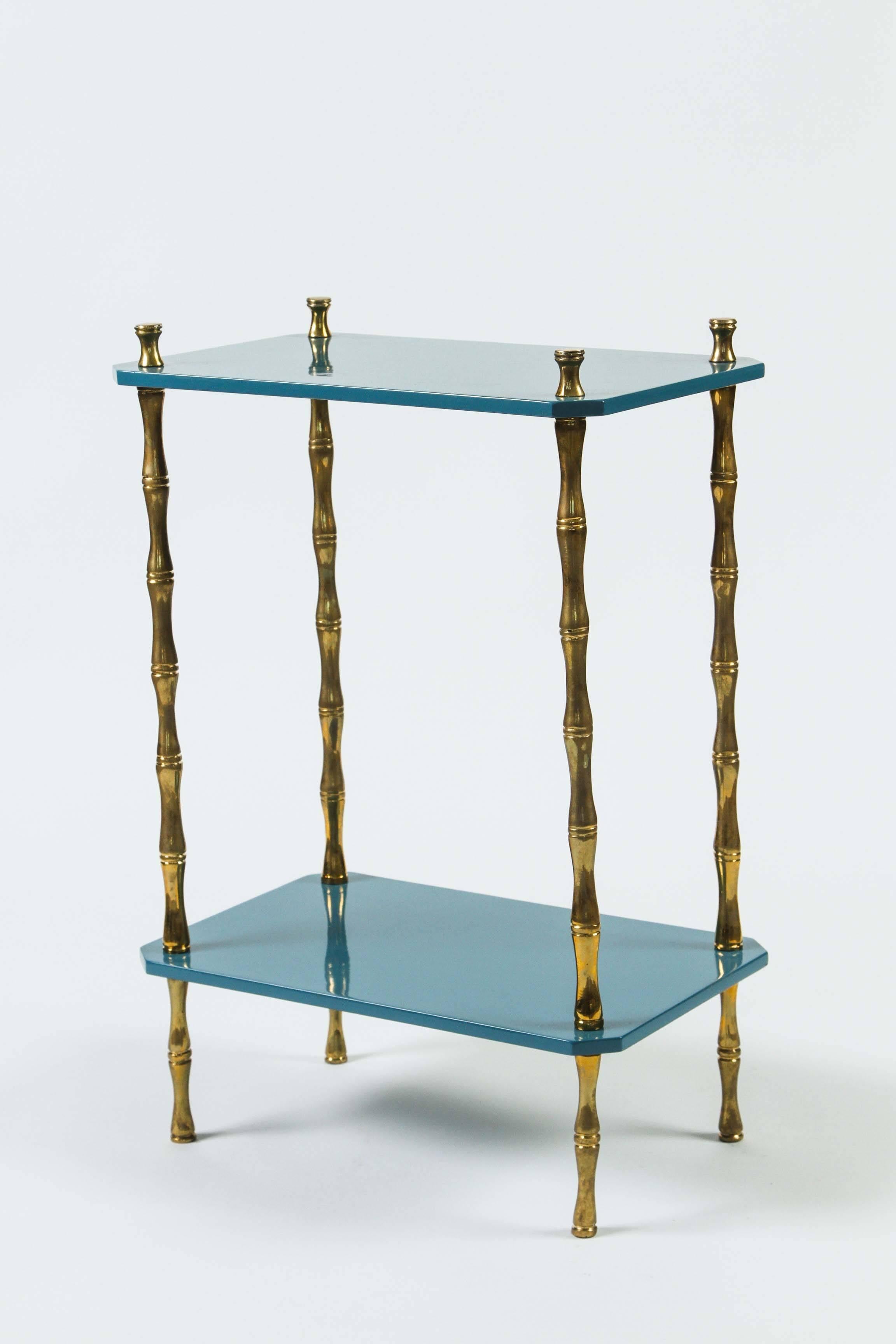 Hollyhock "Freddie" drinks table in teal blue with brass bamboo legs. Also available in oxblood and leaf green.