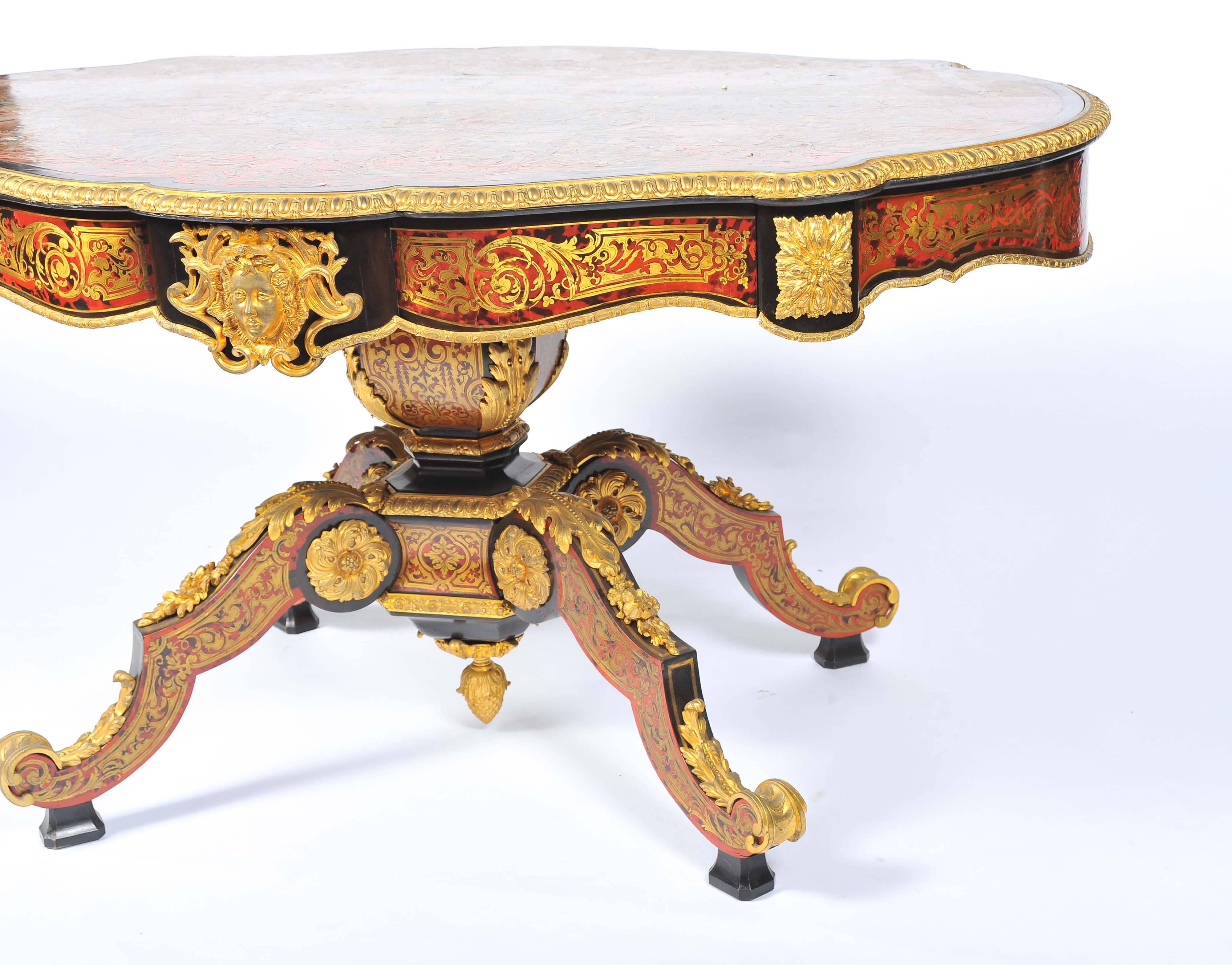 A very good quality French 19th century boulle inlaid centre table, having gilded ormolu mounts, a single frieze drawer and raised on a four splay out swept base.