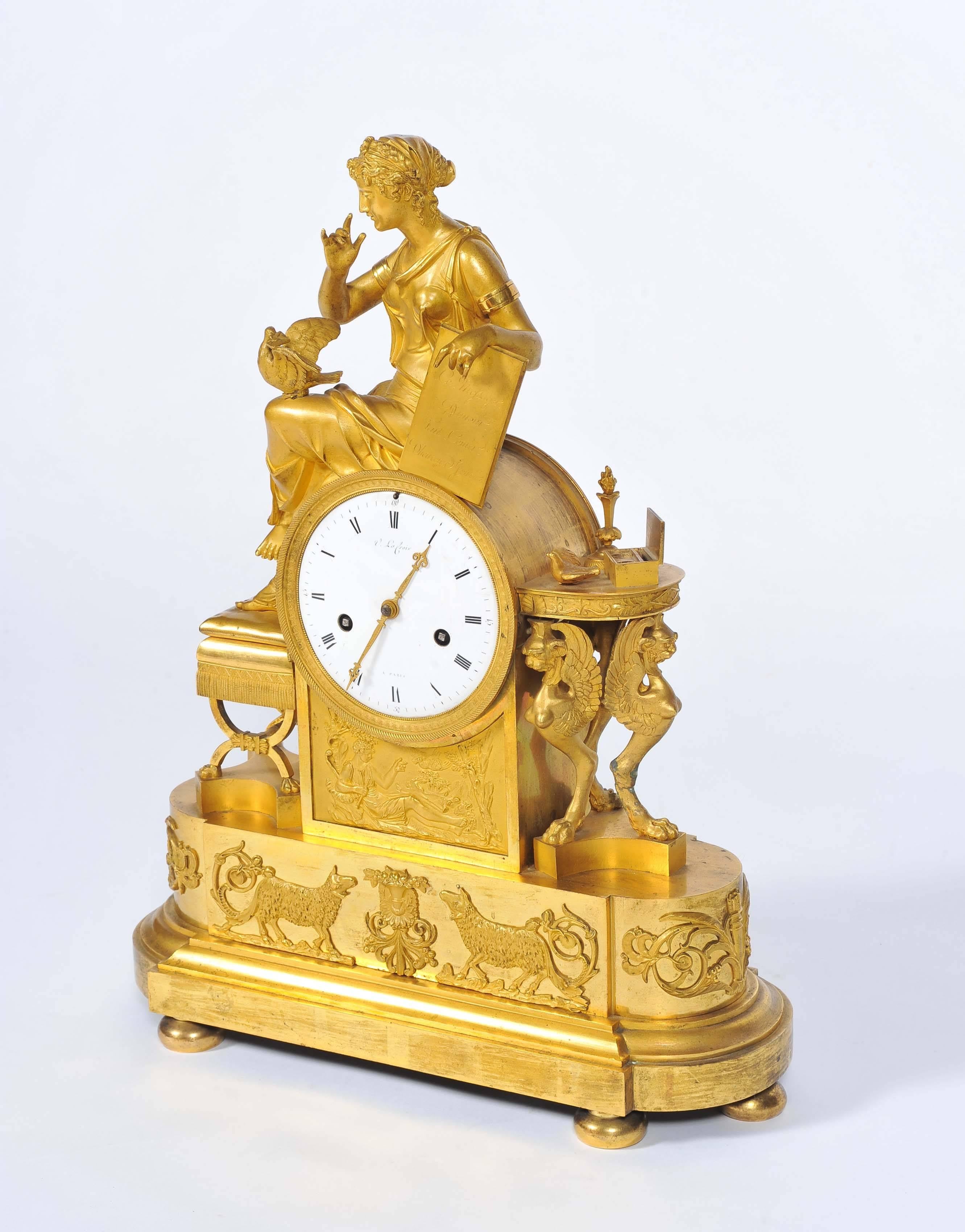 A very good quality French gilded ormolu mantel clock, depicting a classical female seated with her feet resting on a stool and a monopodia supported table. The eight-day chiming movement having an enamel dial.
Signed; LaCroix, Paris.