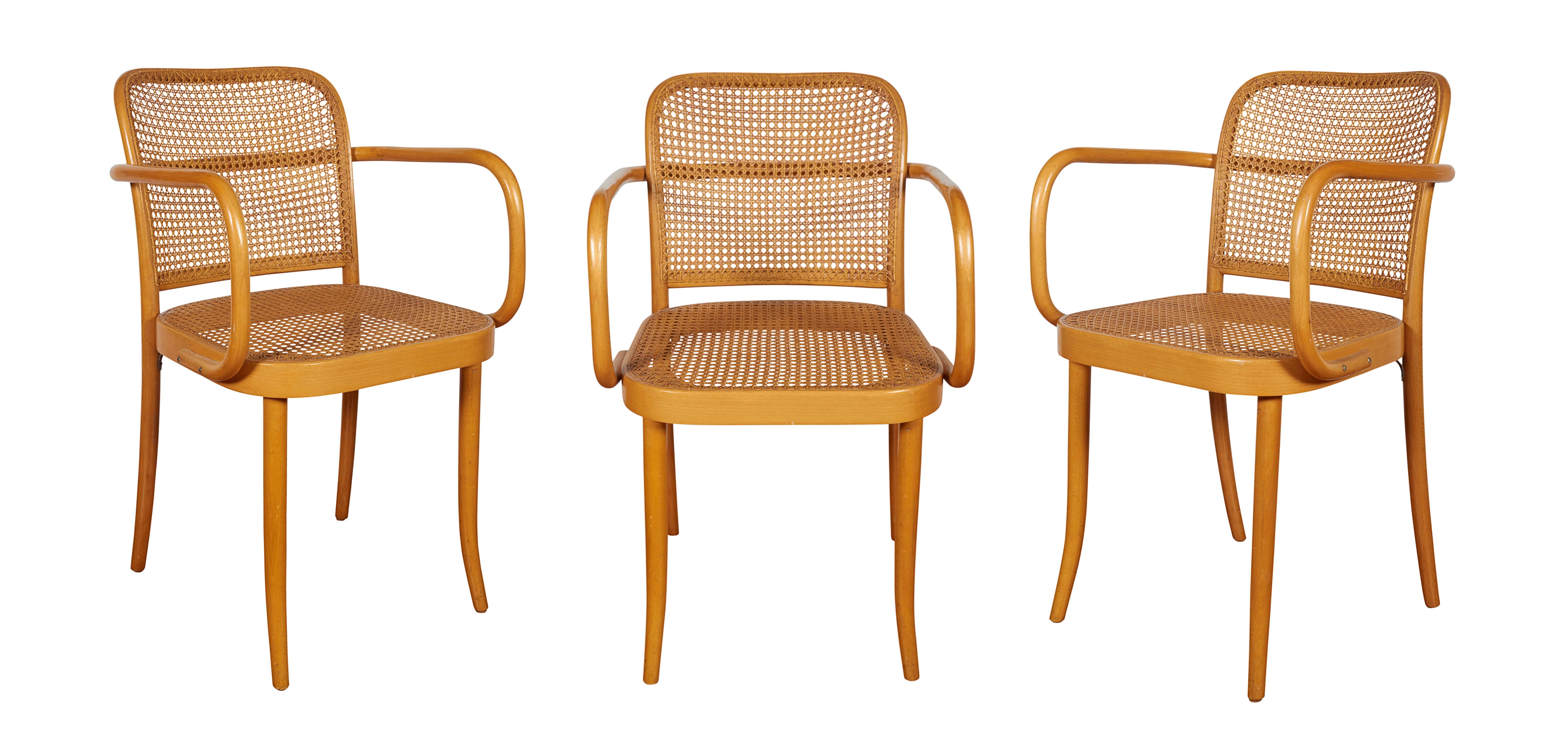 A set of eight 'Prague' arm and side dining chairs by Bauhaus designer Josef Hoffmann, manufactured in Czechoslovakia, circa 1960s, and imported by Stendig, with cane seats and backs against curved bentwood frames; comprising 2 arm and 6 side.