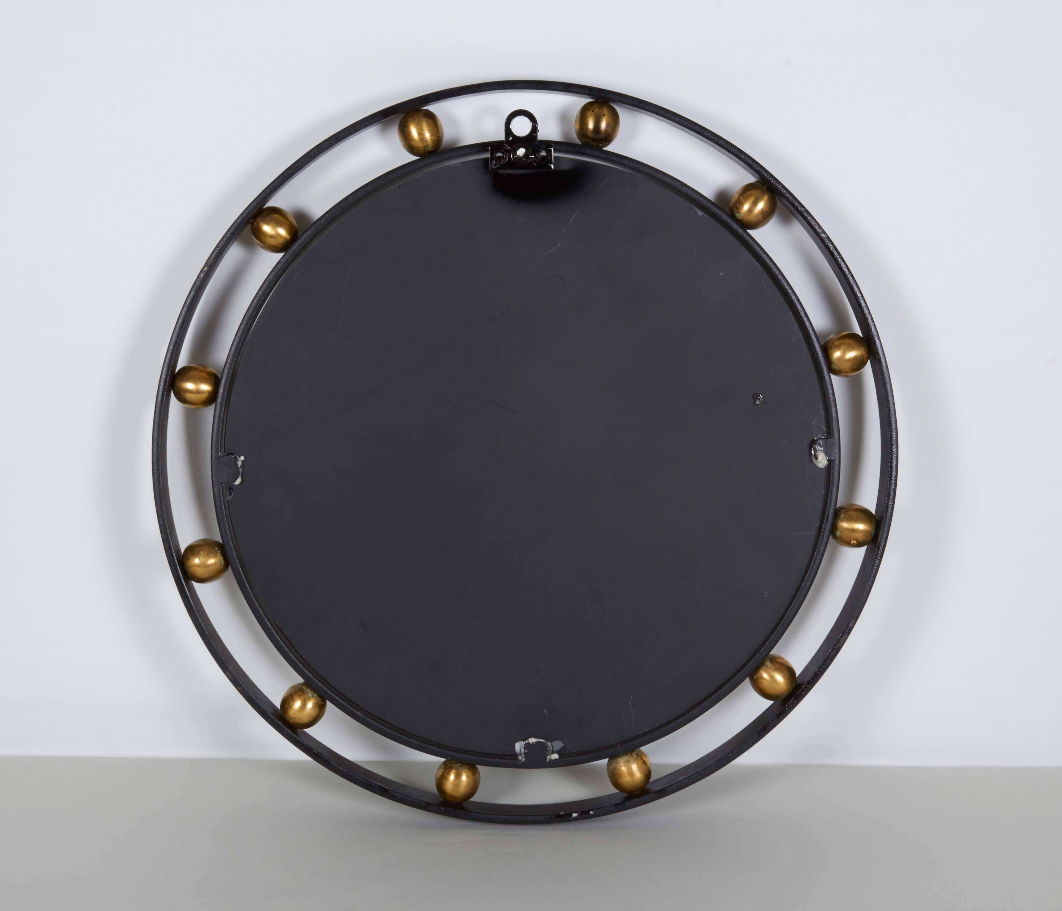French Modern Style Round Wrought Iron Mirror with Brass Ball Detail In Good Condition In New York, NY