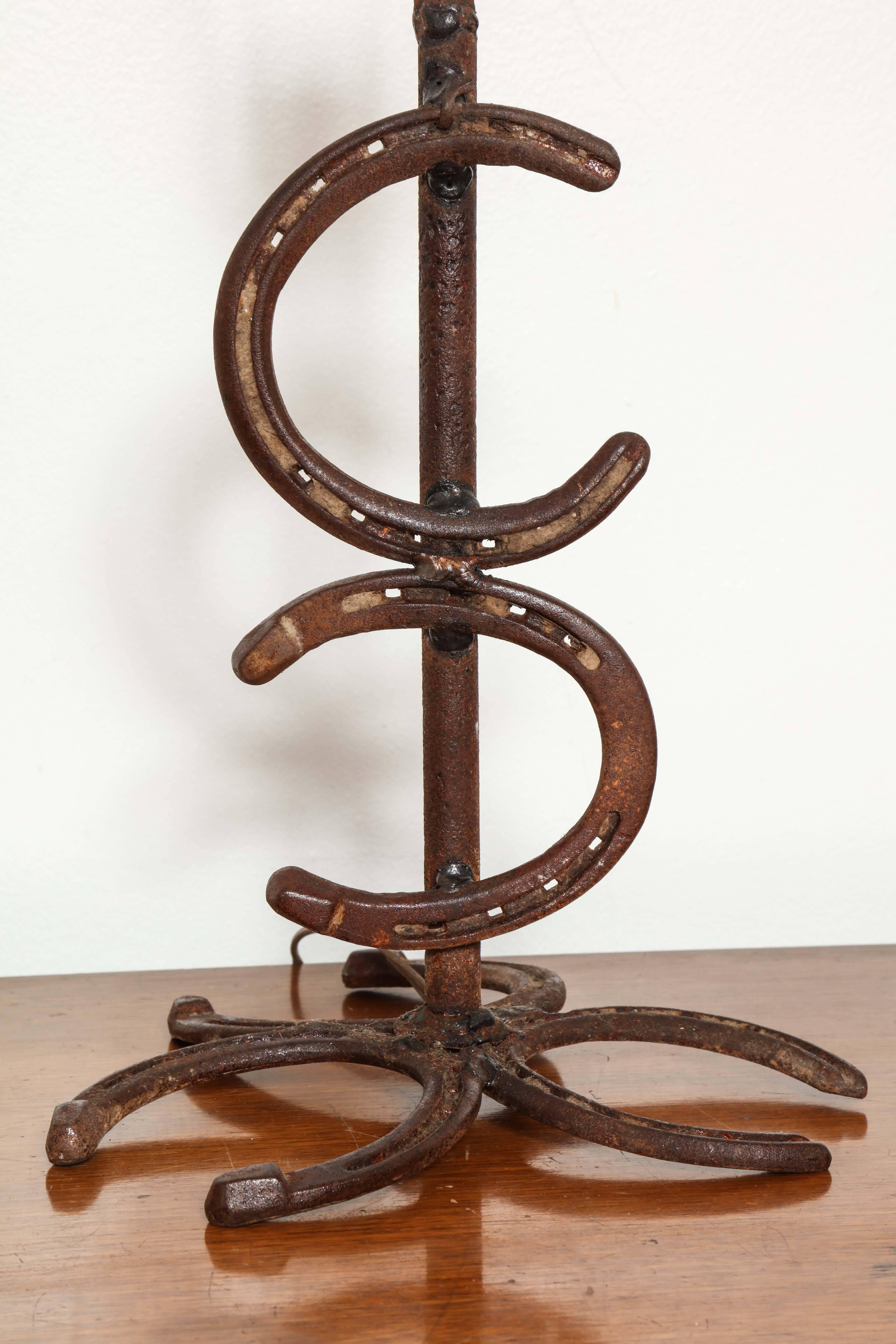 Rustic Pair of Hand-Forged Horseshoe Lamps For Sale