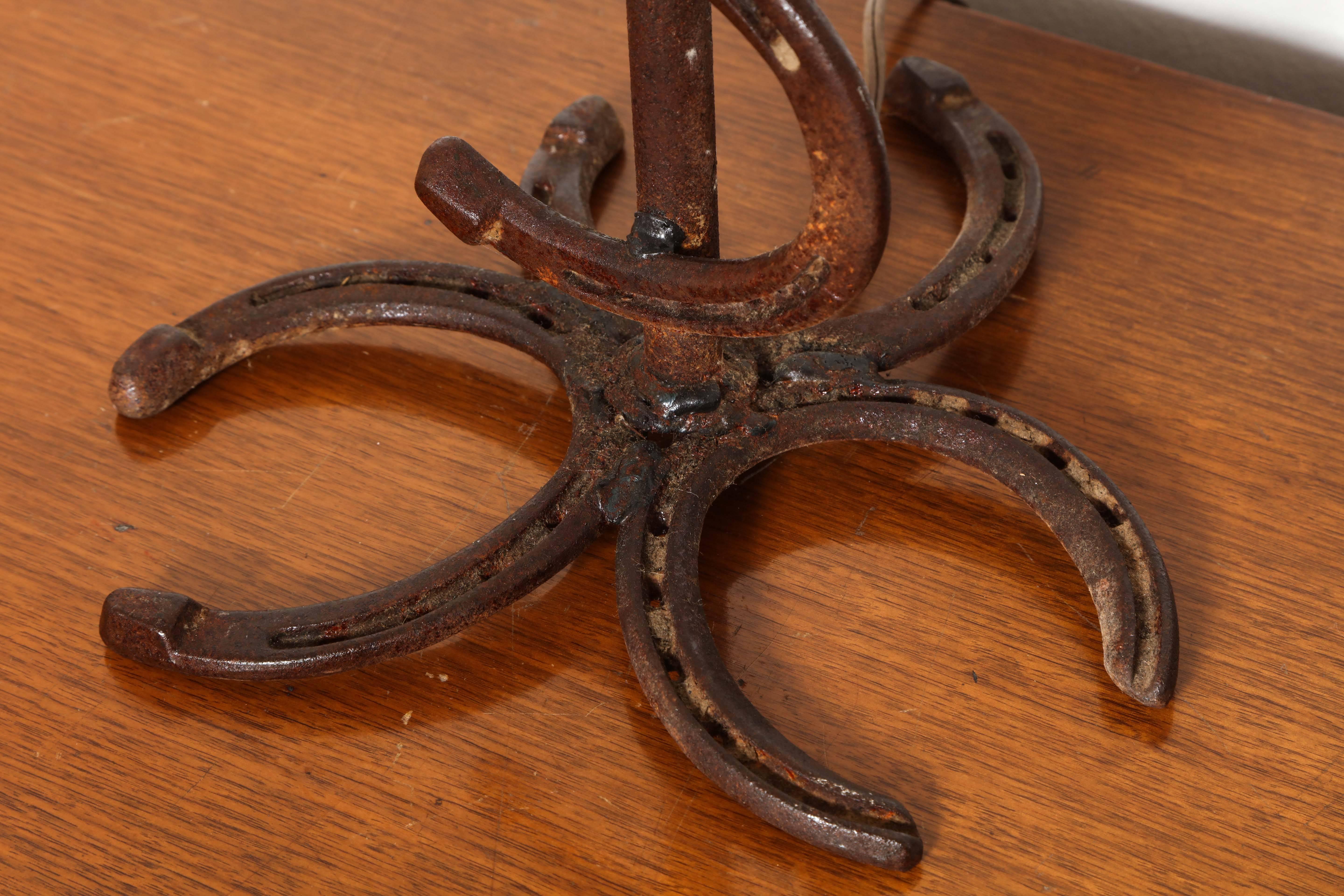 Hand-Crafted Pair of Hand-Forged Horseshoe Lamps For Sale