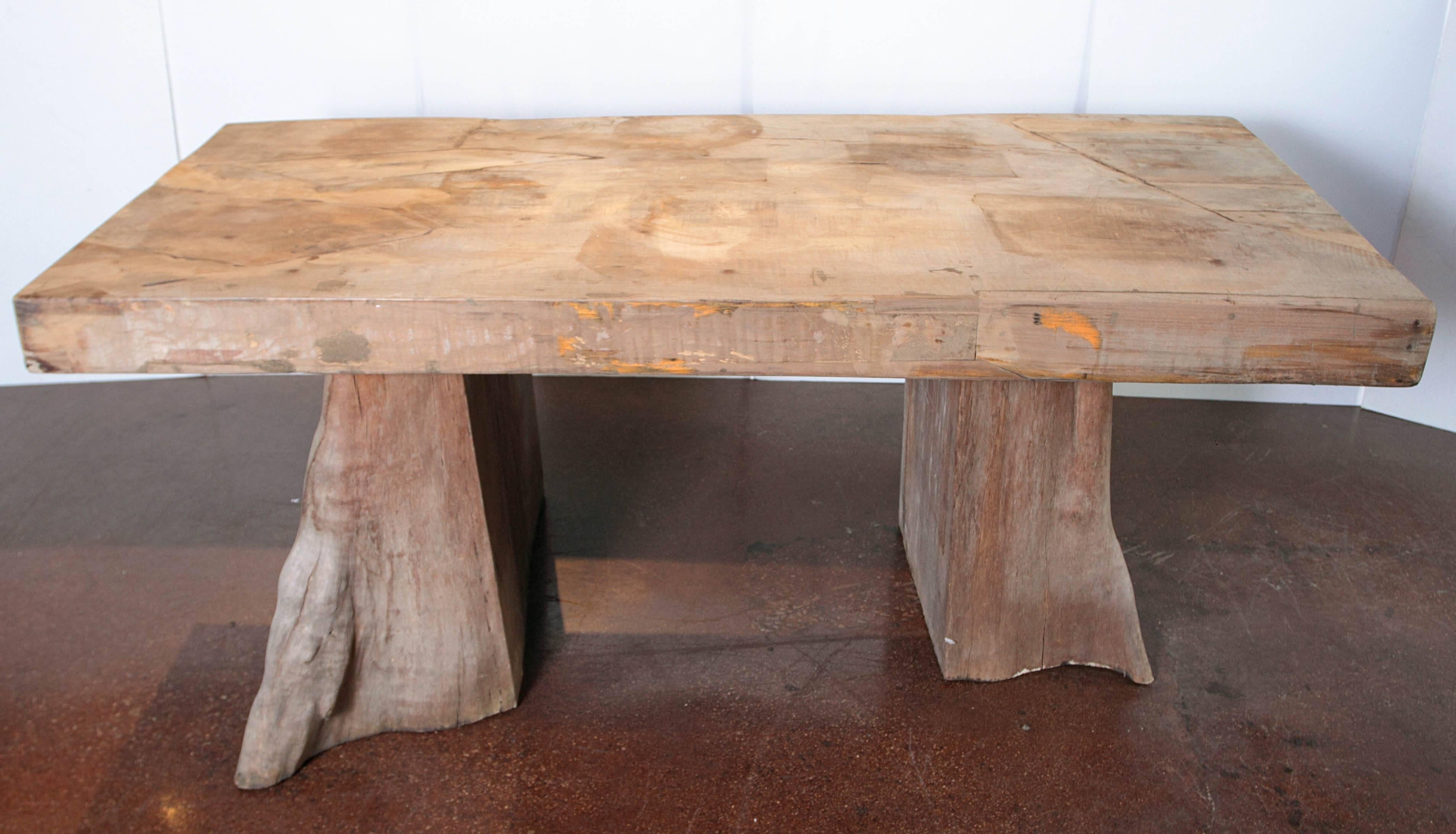 South Asian Slab Top Teak Dining Table with Organic Base Supports