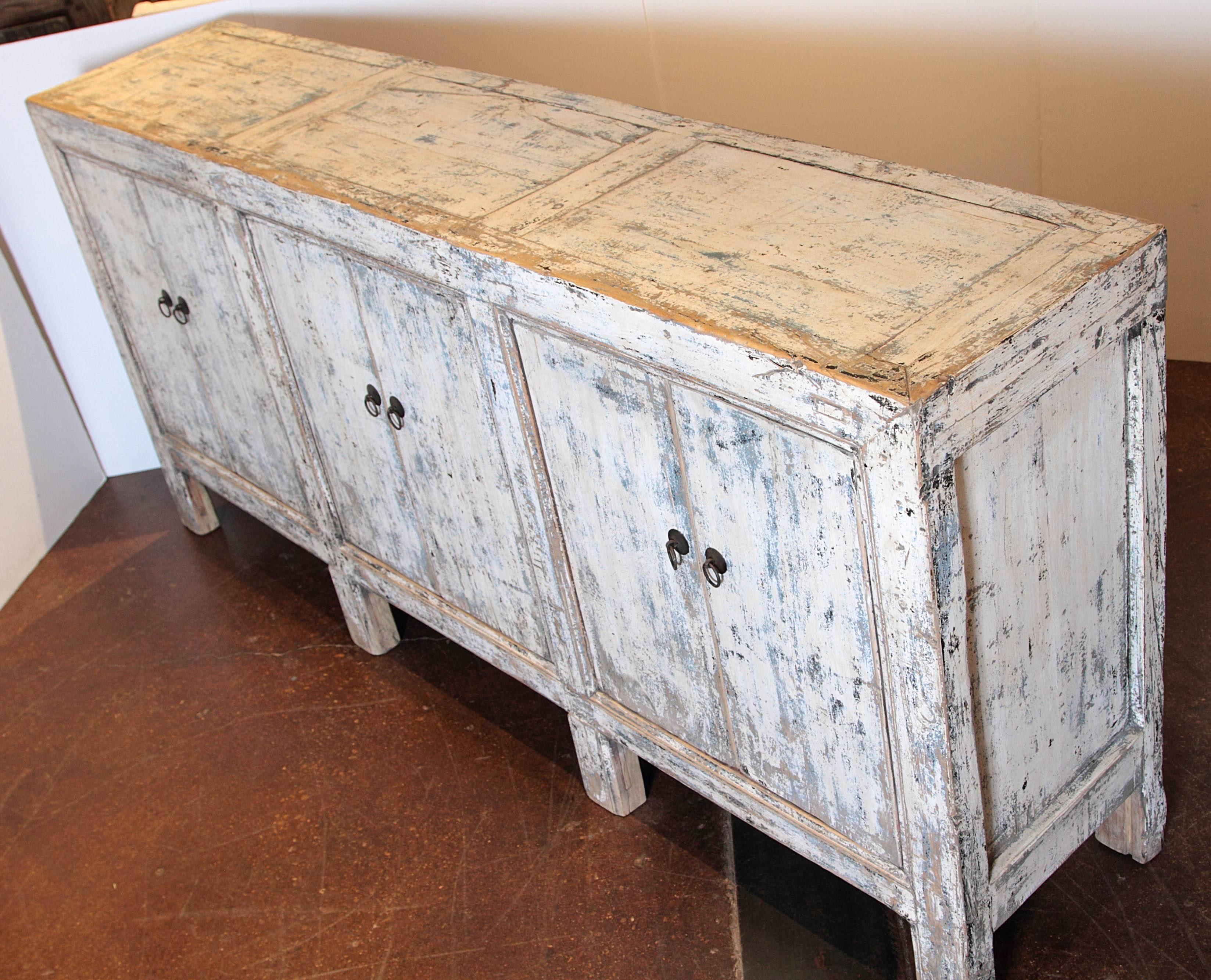 distressed white sideboard