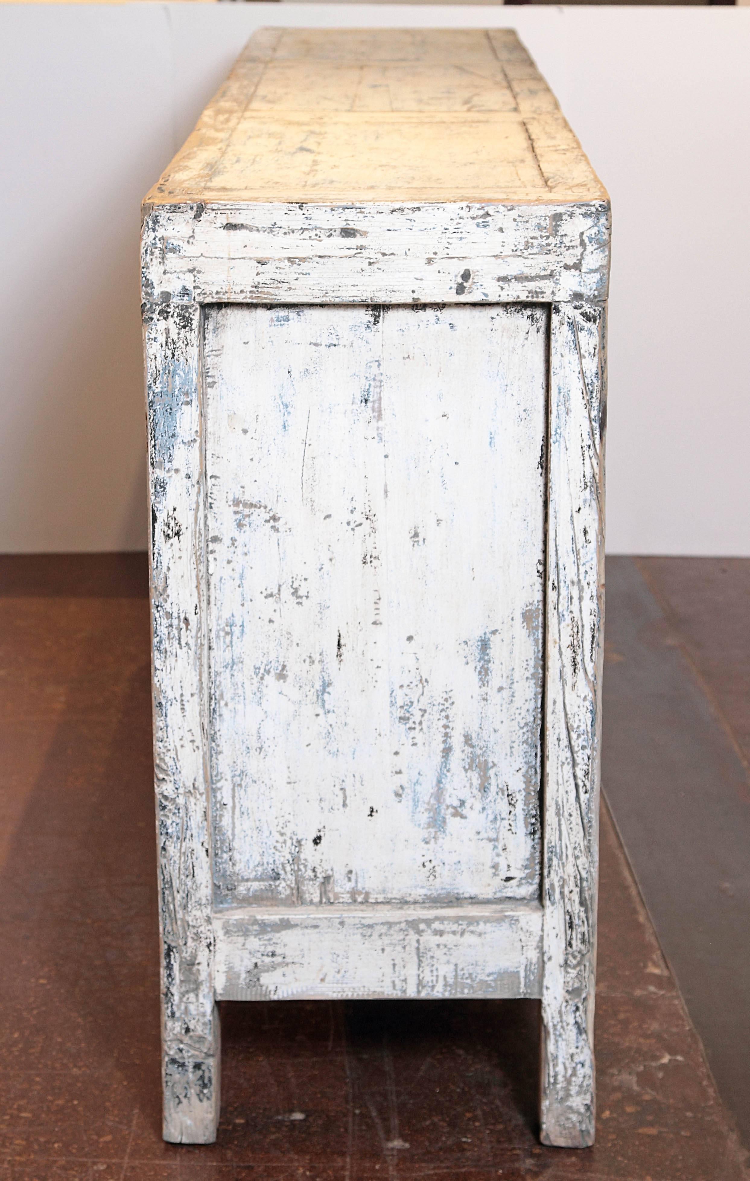 distressed white credenza