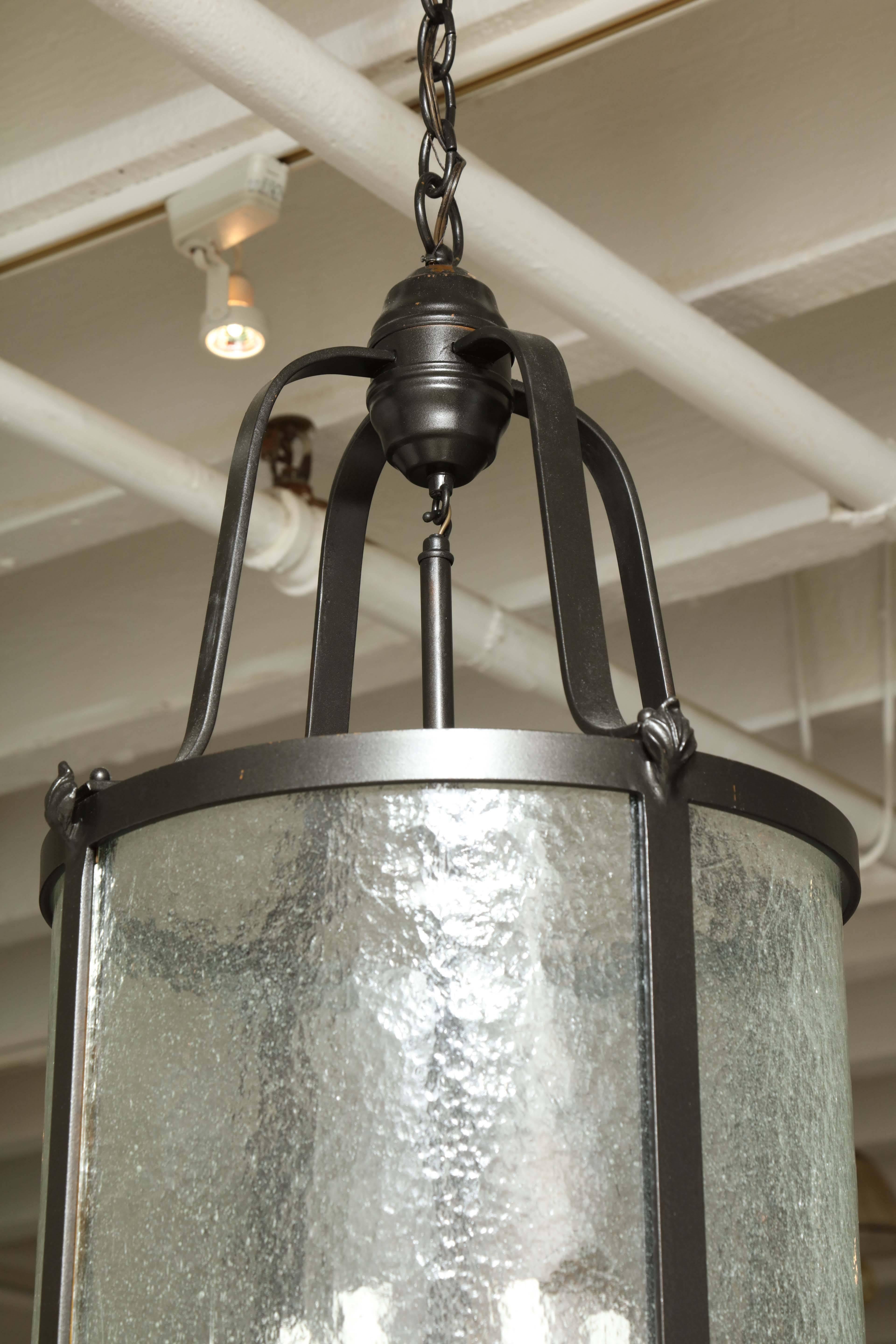 Mid-20th Century oil-rubbed bronze and glass chandelier.