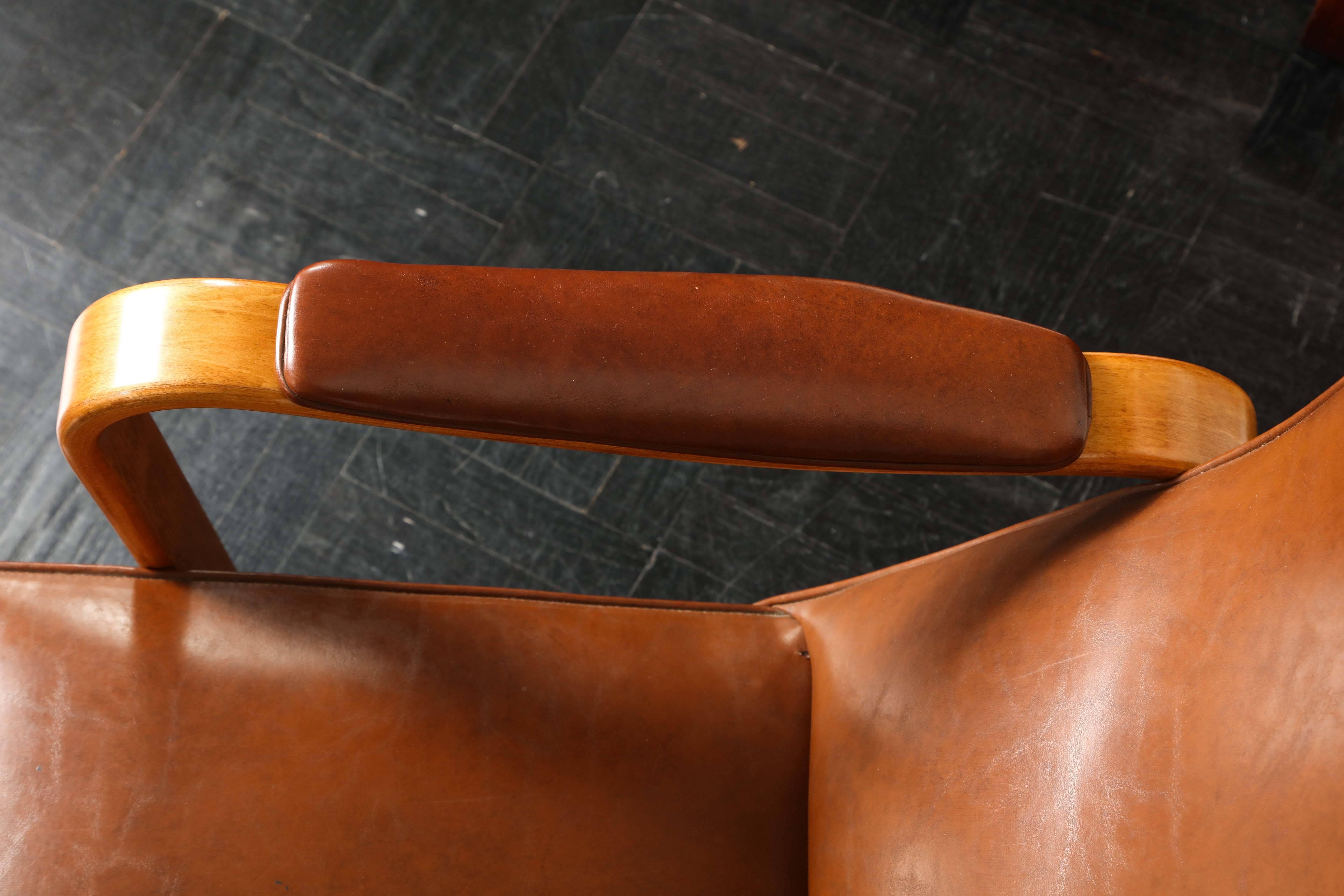 Wood Mid-20th Century Walnut and Leather Open Armchair For Sale