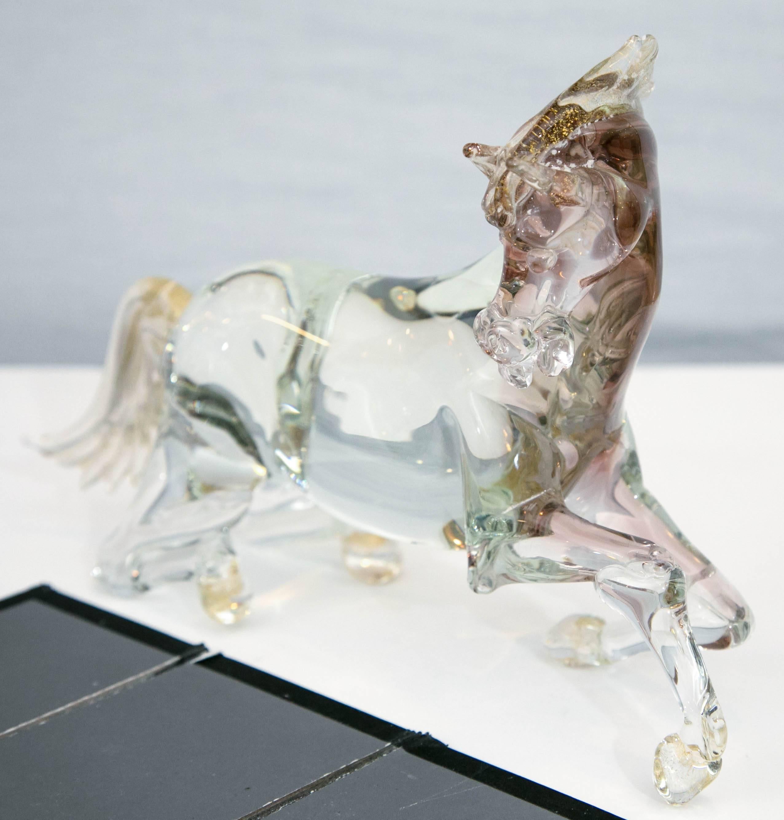 Magnificent handcrafted Murano glass horse sculpture attributed to Giancarlo Signoretto. Shades of purple and fleck of gold in solid glass sculpture.
