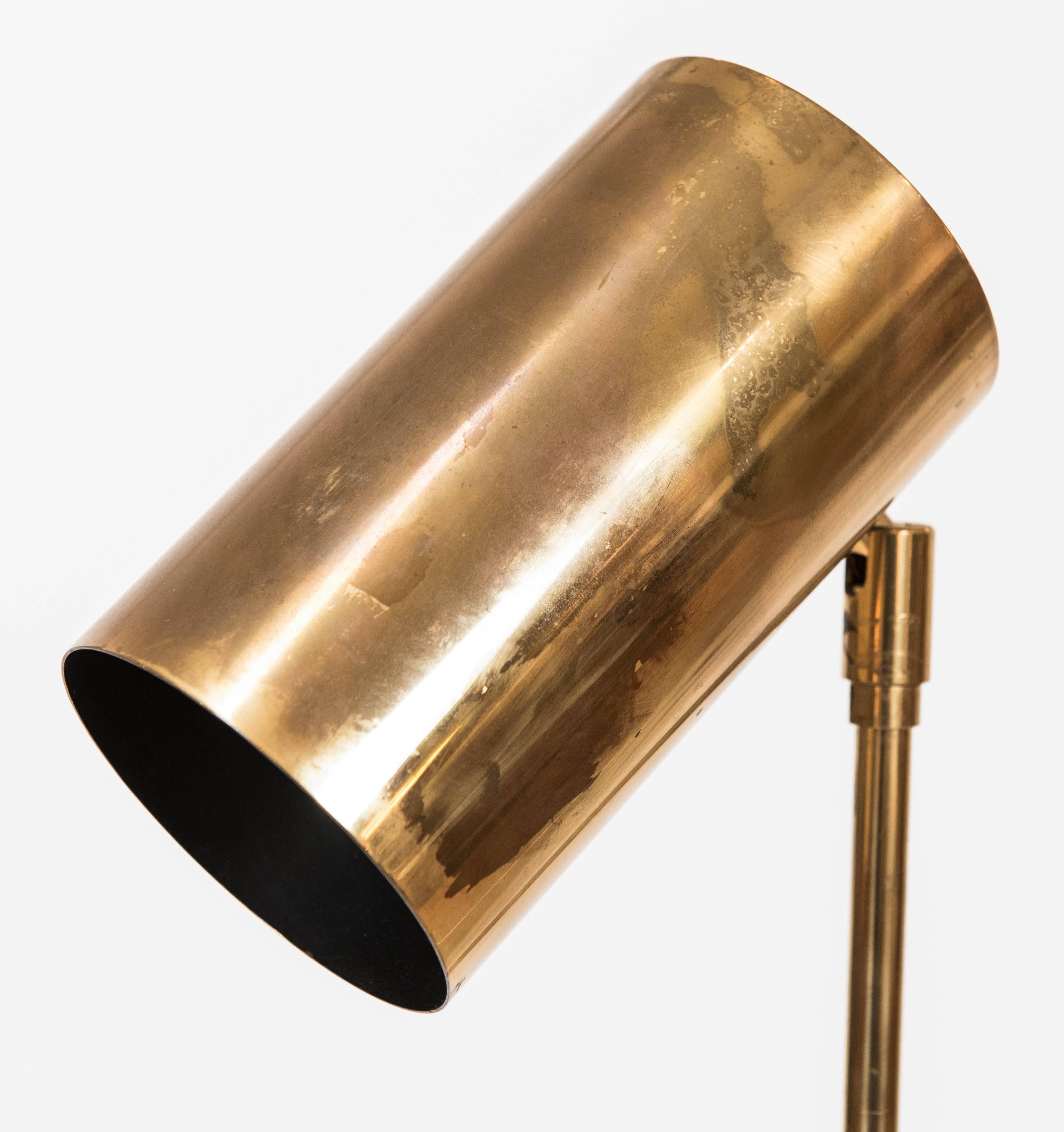 A stylish brass lamp by American Robert Sonneman for George Kovacs lighting. Great patina.