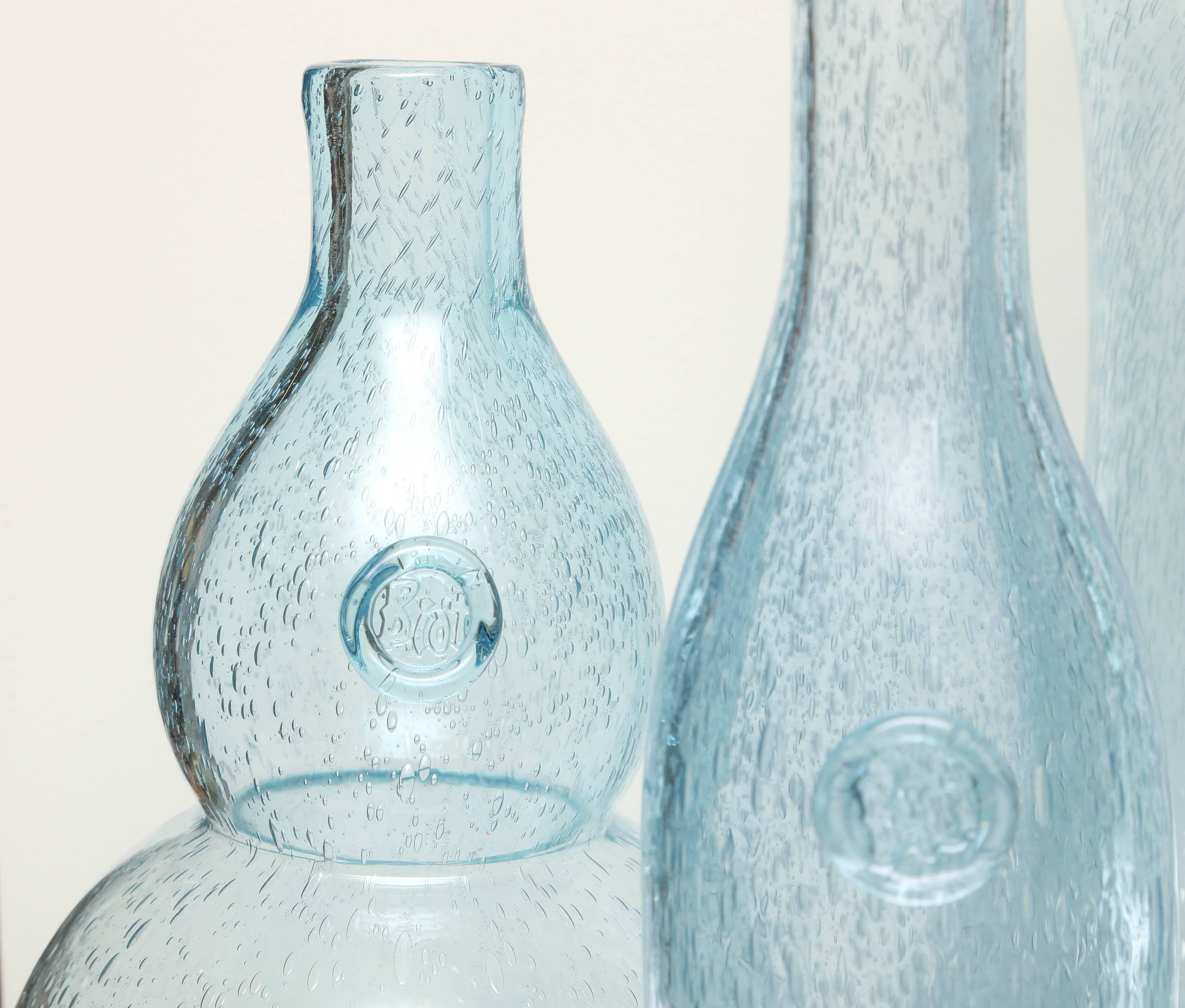 Interesting collection of six blue French handblown bottles and vases made in Biot, France.