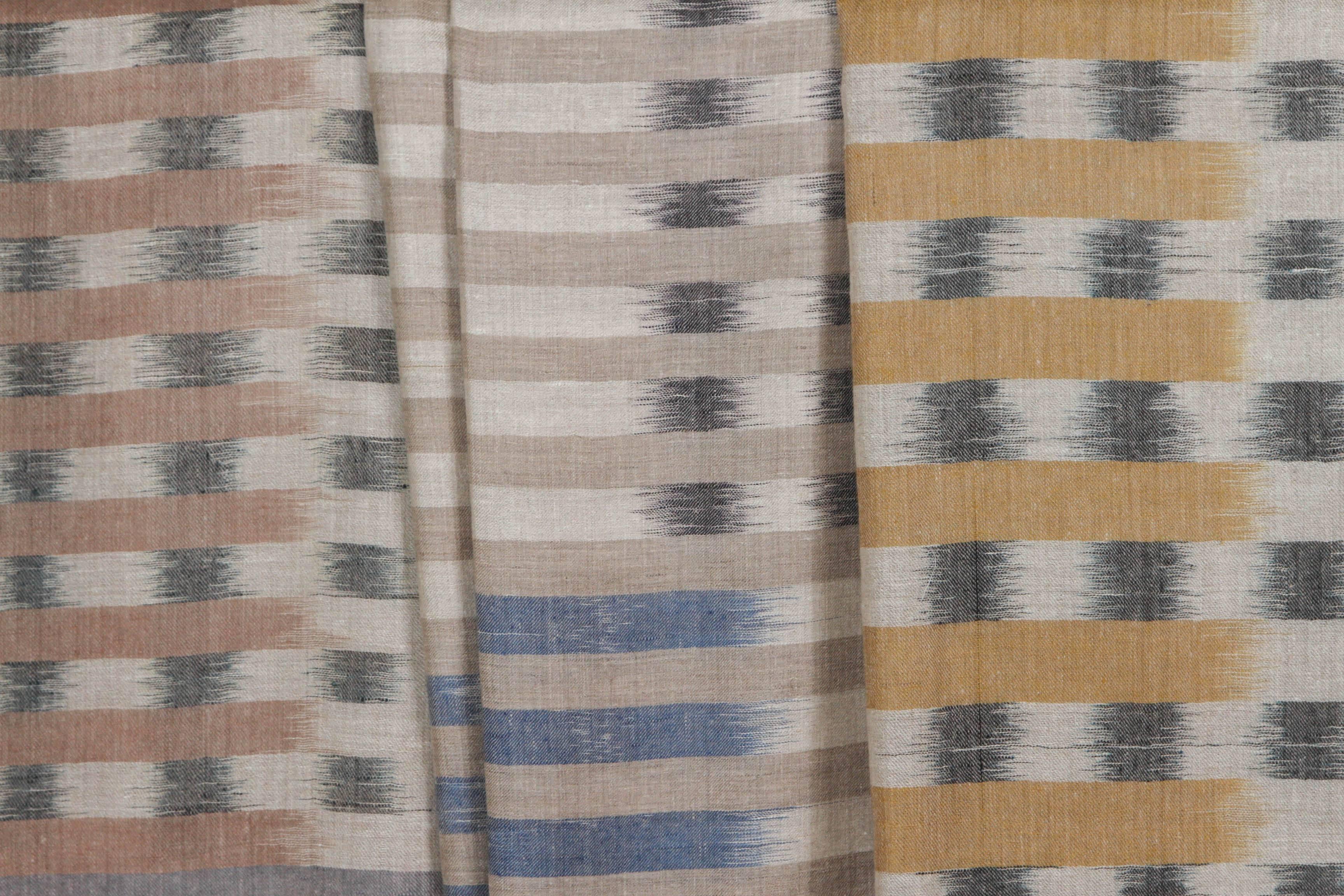 Finest quality Kahmiri Indian cashmere. Three color ways: Left: Cafe au lait, charcoal and natural ivory. Middle: Blue, charcoal, light gray and natural ivory. Right: Gold, charcoal, terra cotta and natural ivory.