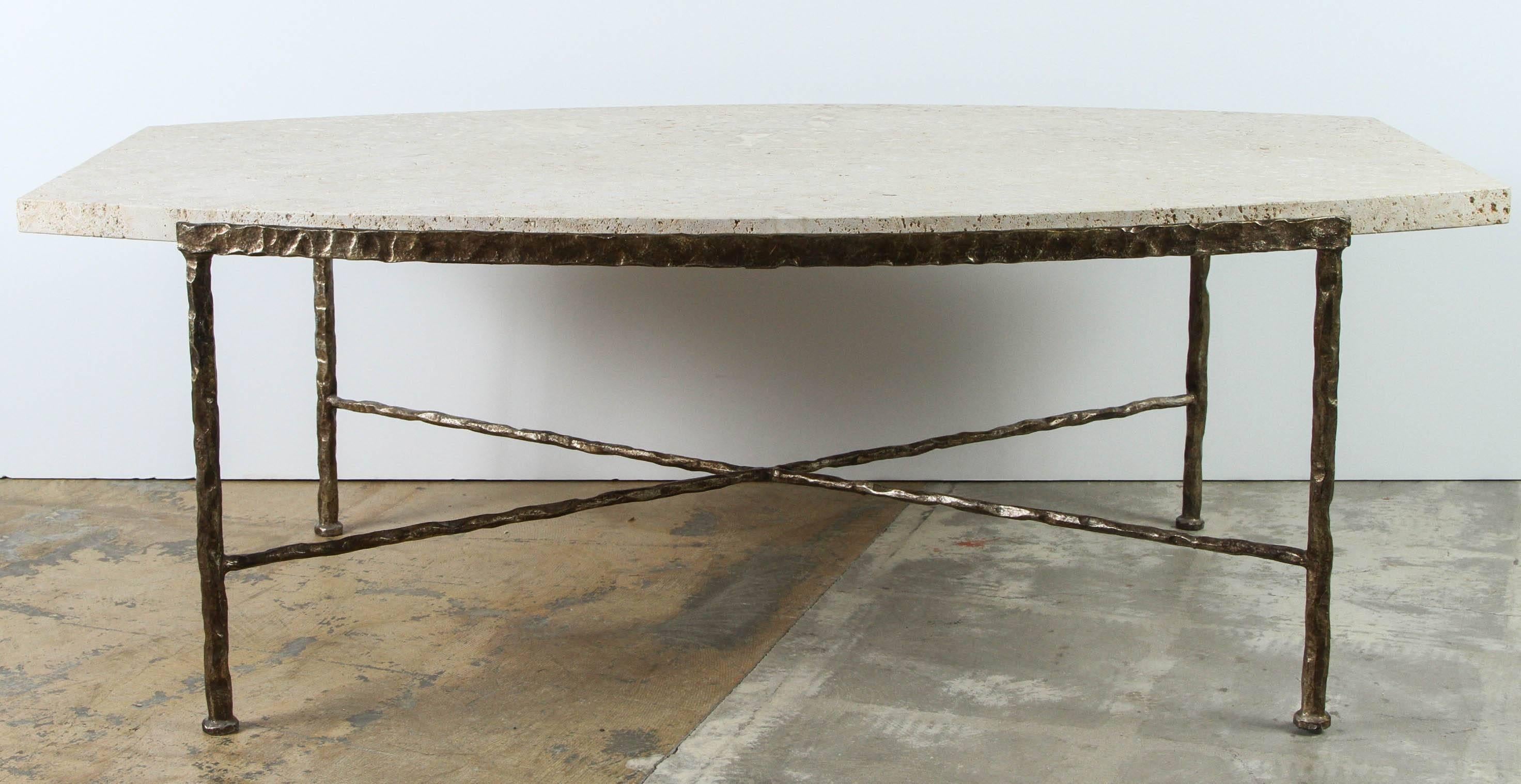Paul Marra Ellipse Cocktail Table in textured iron with gold wash and shellstone pietra. Bow-shape, hand-hammered, Giacometti vibe. By order.