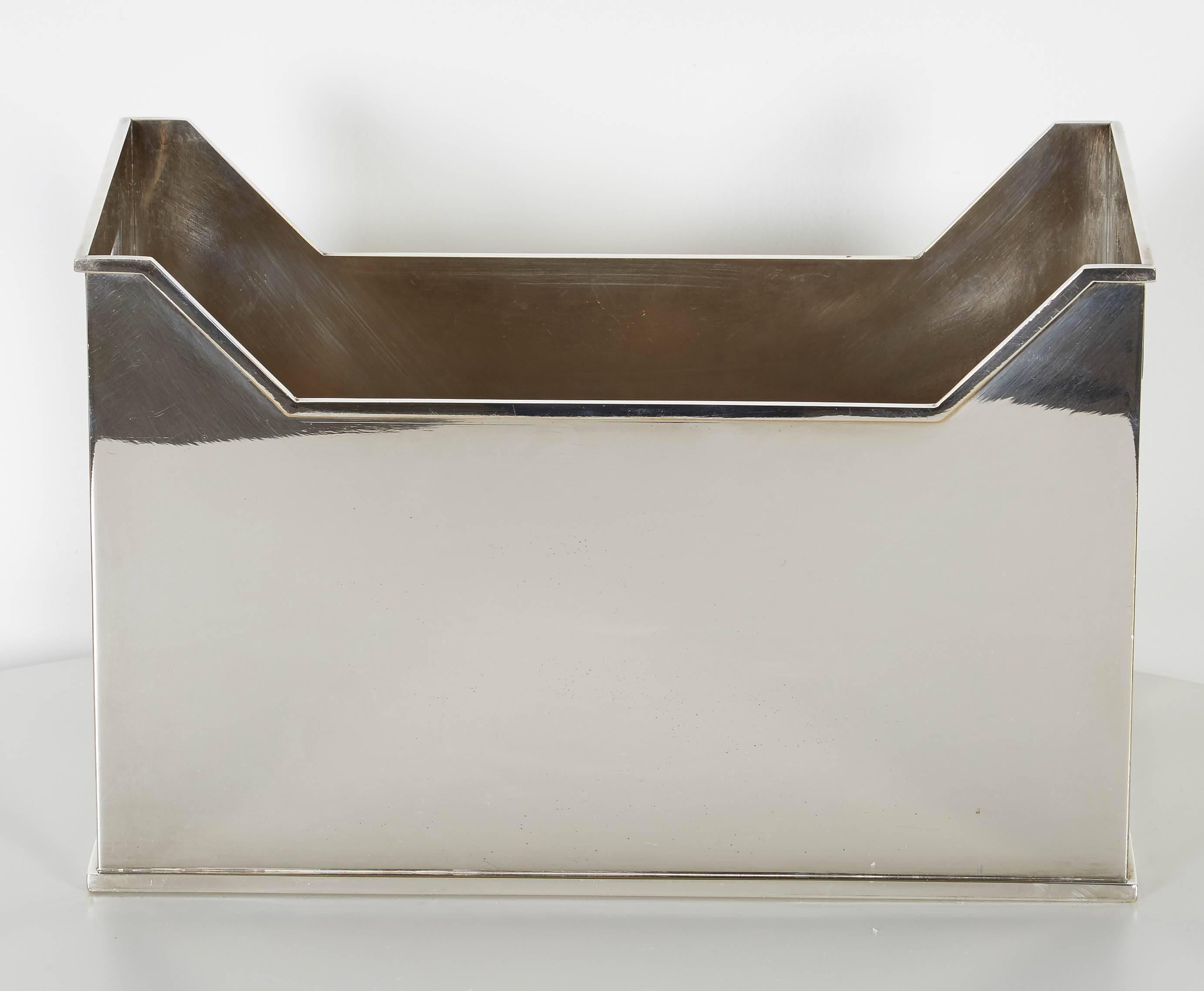 A rectangular silvered metal container with handles. Unmarked.