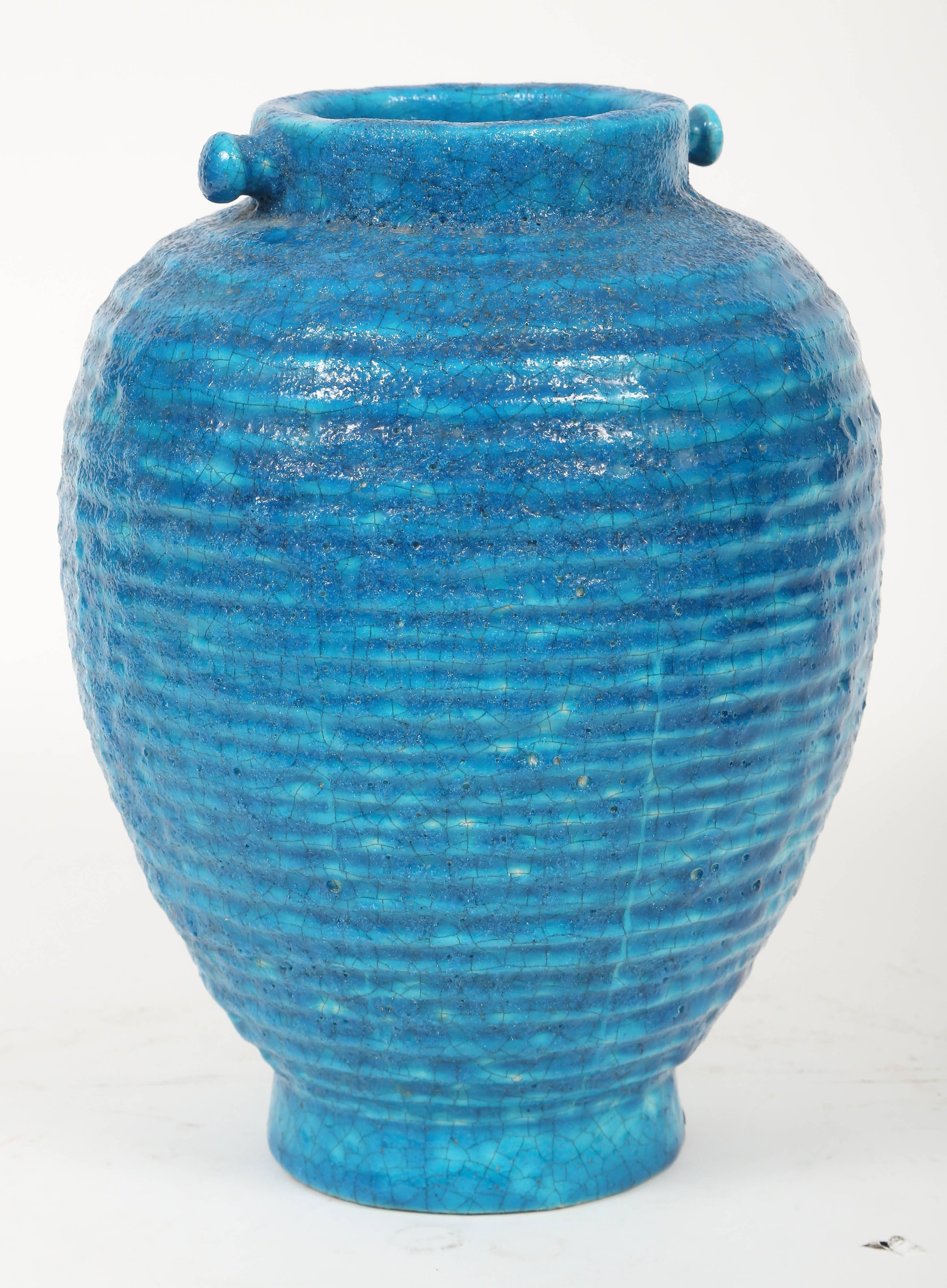 Unusual ribbed Lachenal vase with decorative posts on rim. Signed LACHENAL on bottom, partially obscured by final glazing.