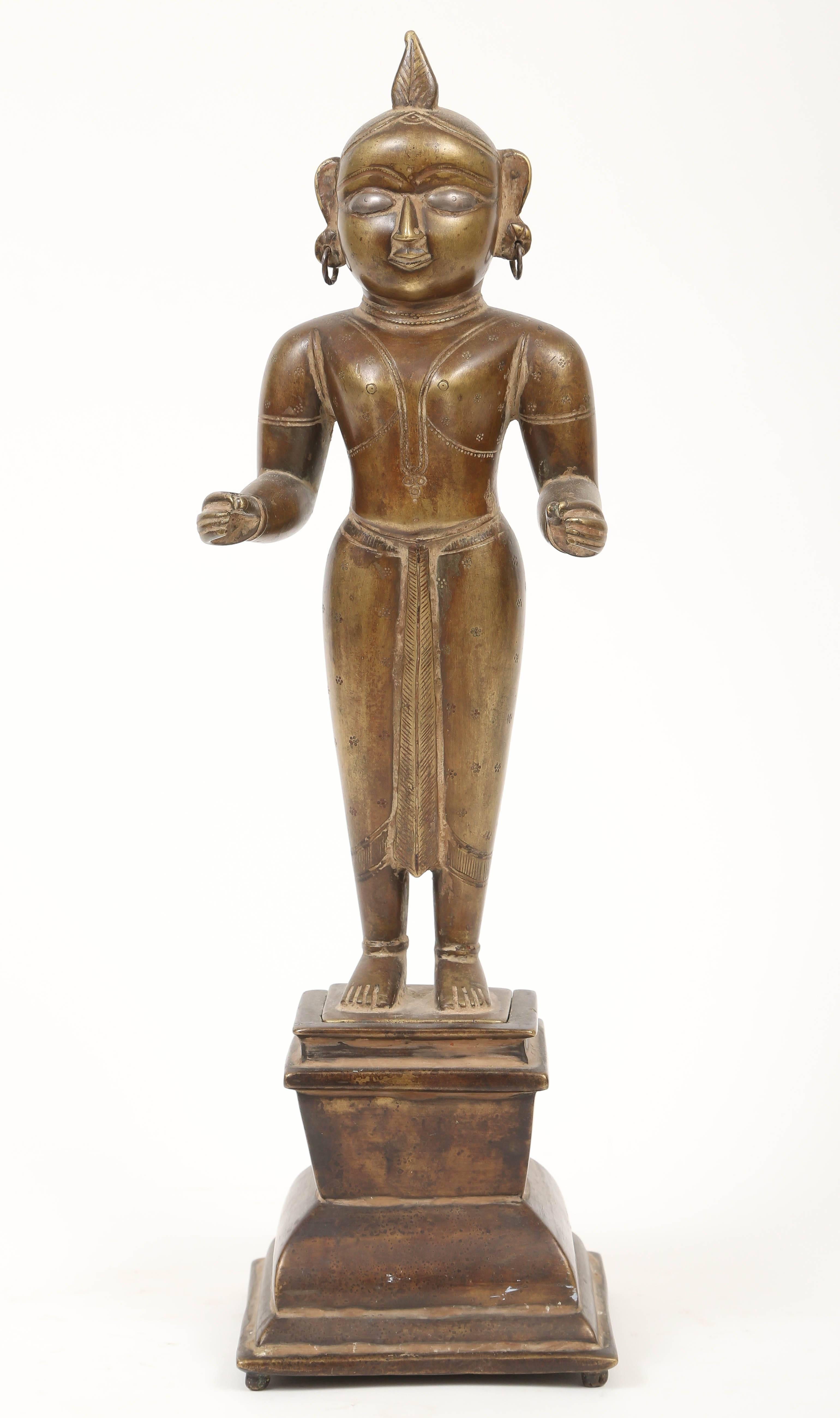 The bronze statuette is cast separately from the base into which it slides. This type of construction is common among bronzes from Karnataka, India.

Krishna is worshiped as a major Hindu deity who is often portrayed as a lover, prankster, hero