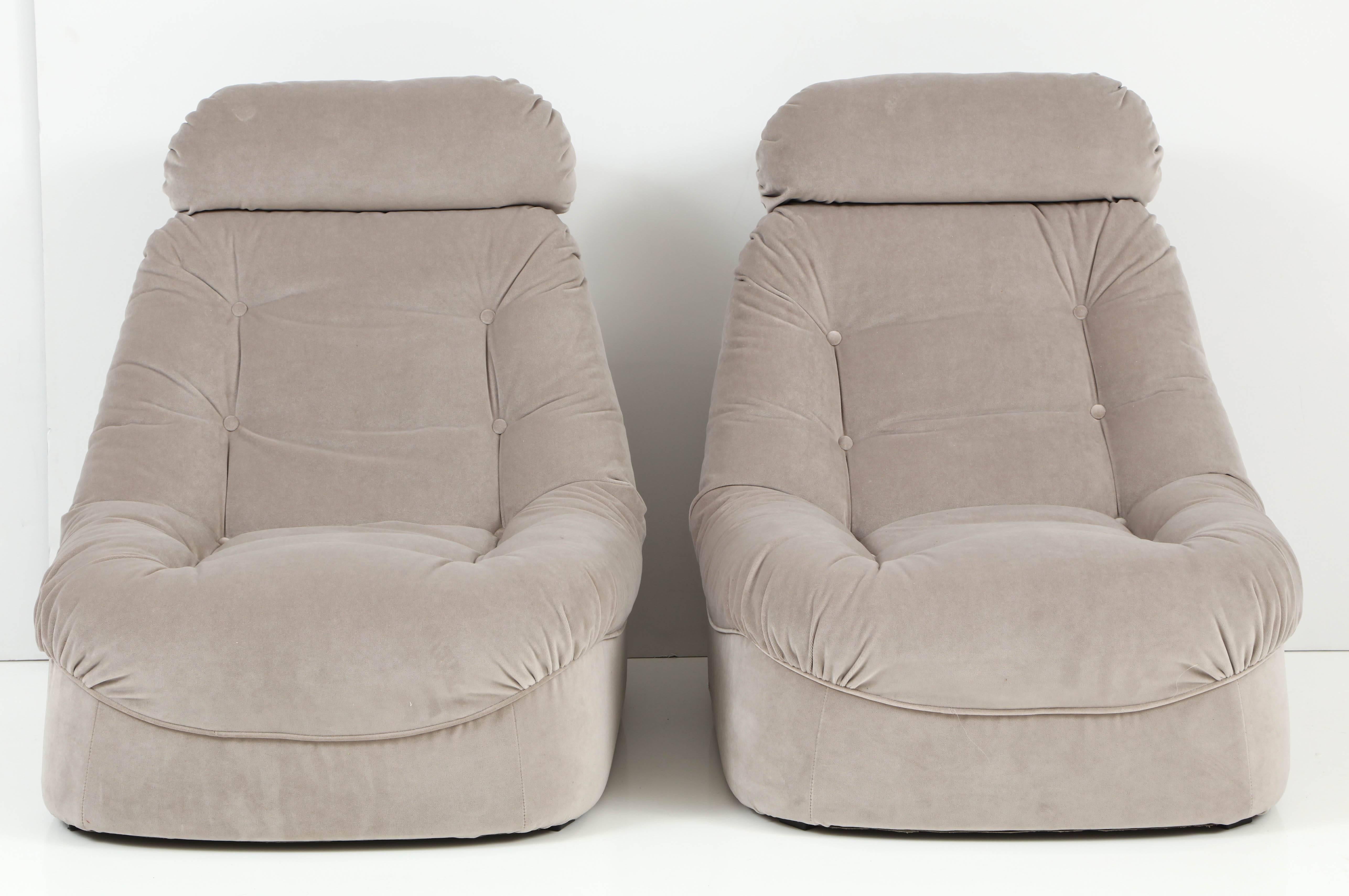 Very comfortable and solid lean back lounge chairs completely restored and newly upholstered with tufted backs and seats in a taupe gray imported cotton velvet. Sculptural in design.

This pair of lounge or slipper chairs is on display at the