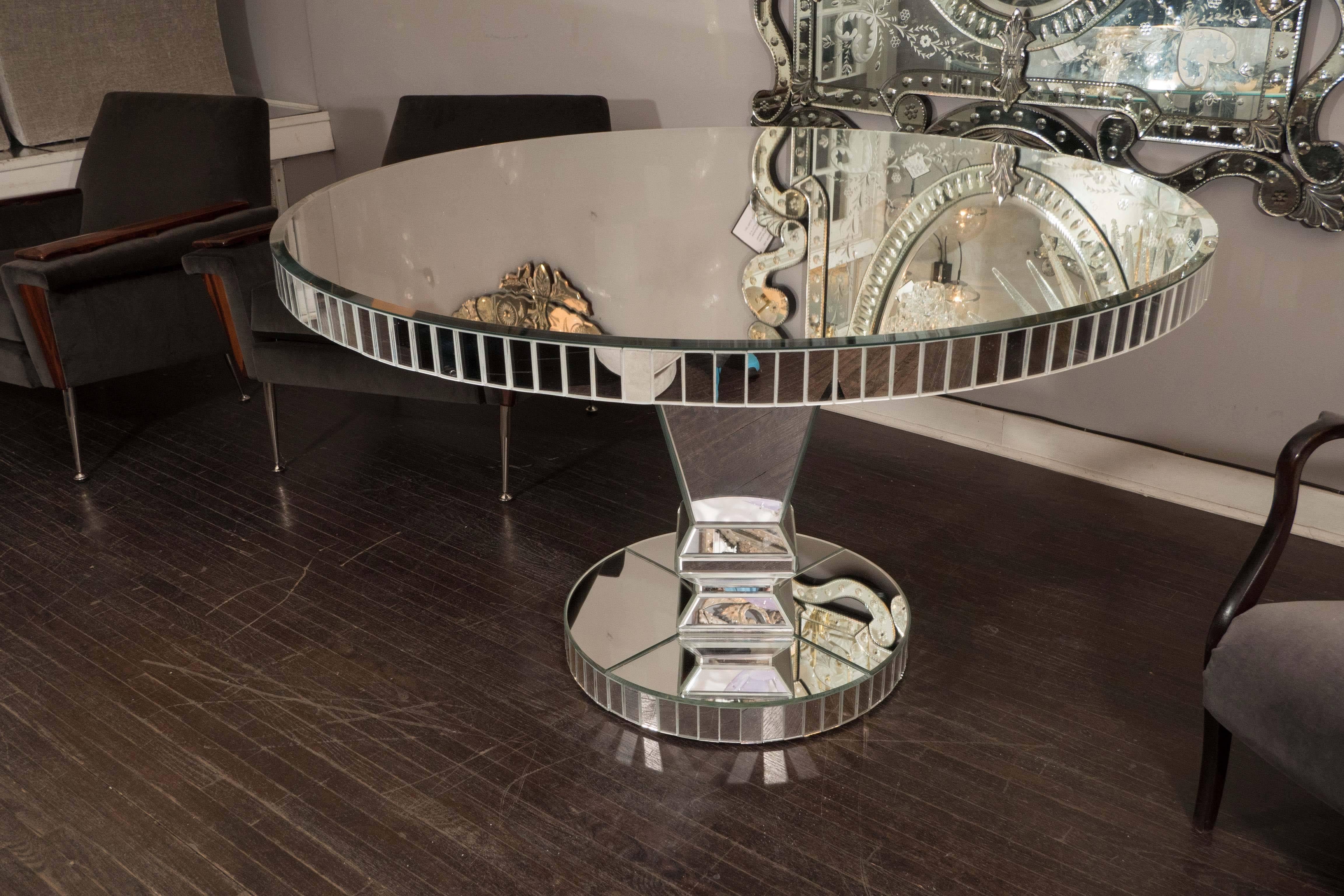 Custom round starfire mirrored dining table with mirrored side Baguettes and pedestal stand base.