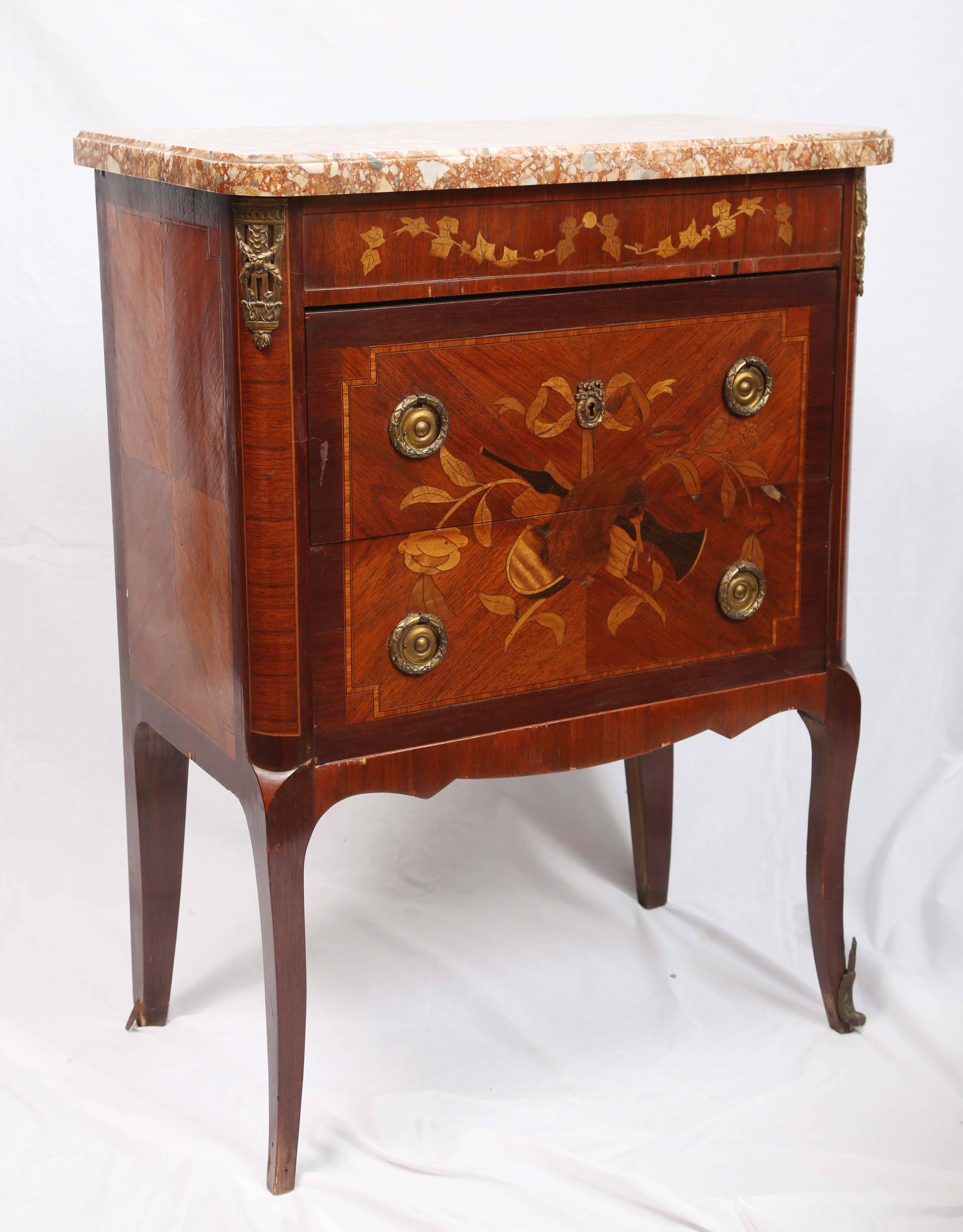 Exquisitely inlaid, with nice proportions and marble top.
