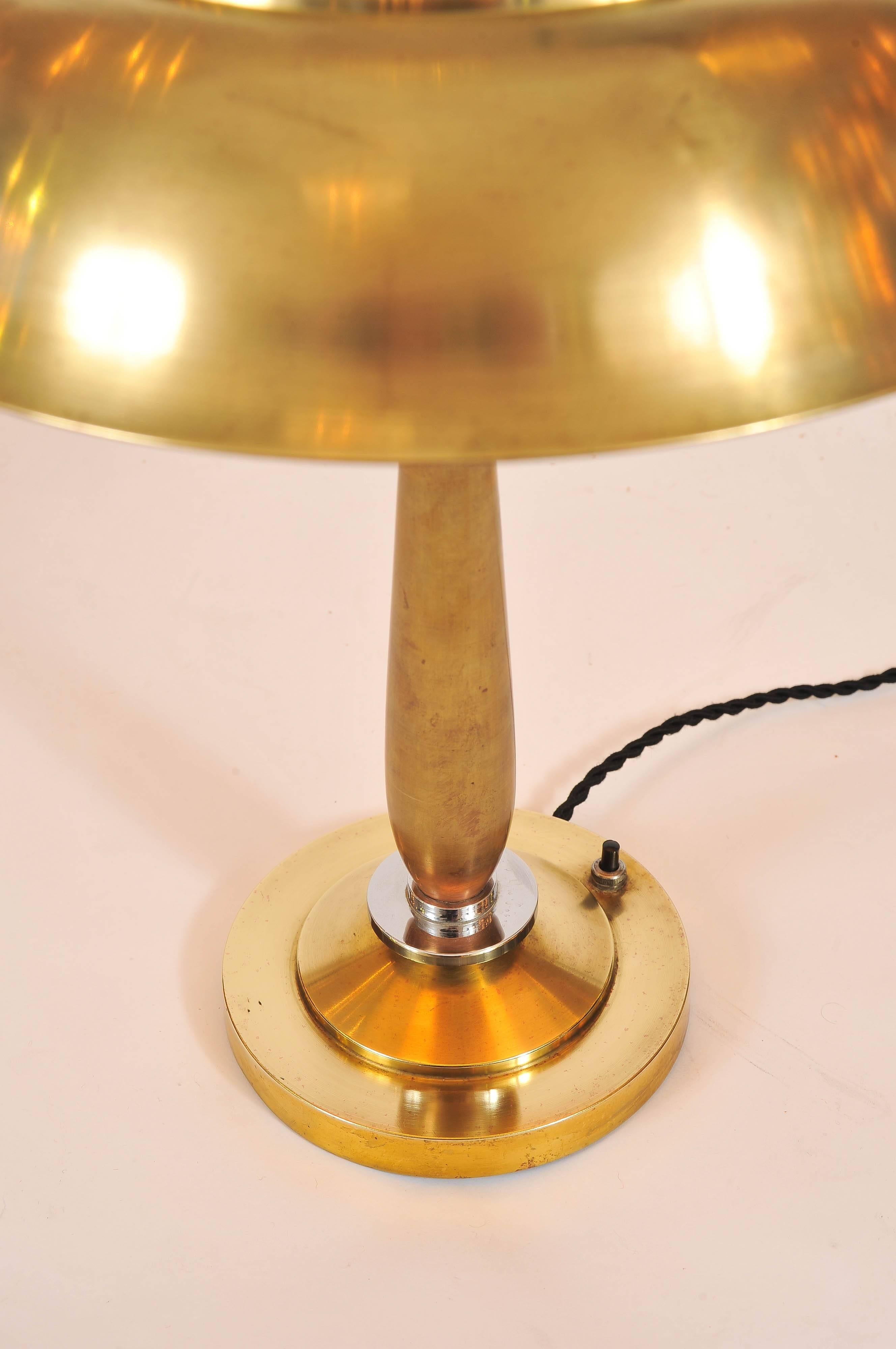 Beautifully detailed domed lamp. The body and dome are made of brass while there are chrome and copper details on the main support. Topped with a small ribbed glass dome.
