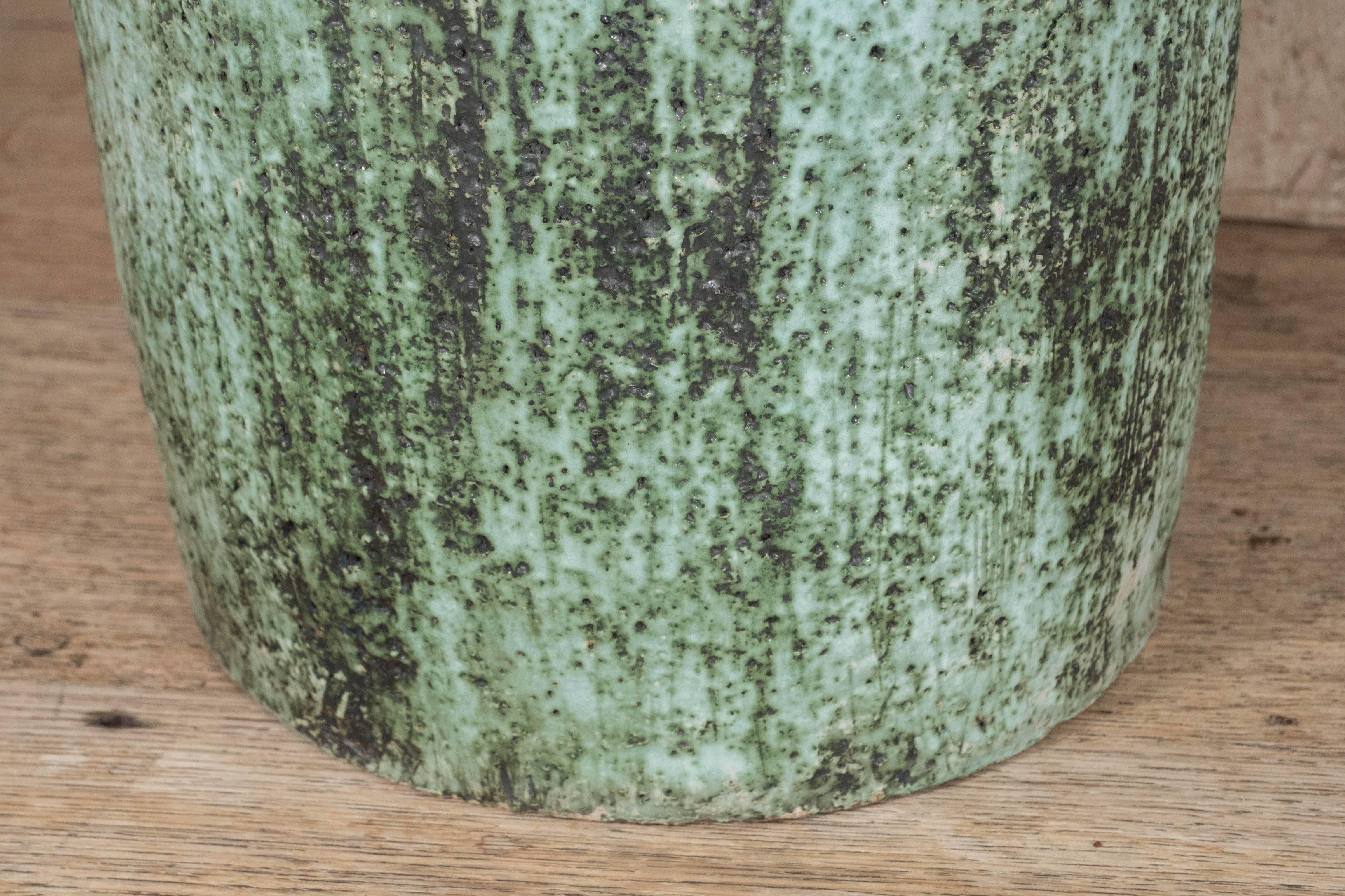 A great looking French ceramic vase with handles in a unique, textured green and white glaze.  Produced by Accolay, Ca. 1950s.

