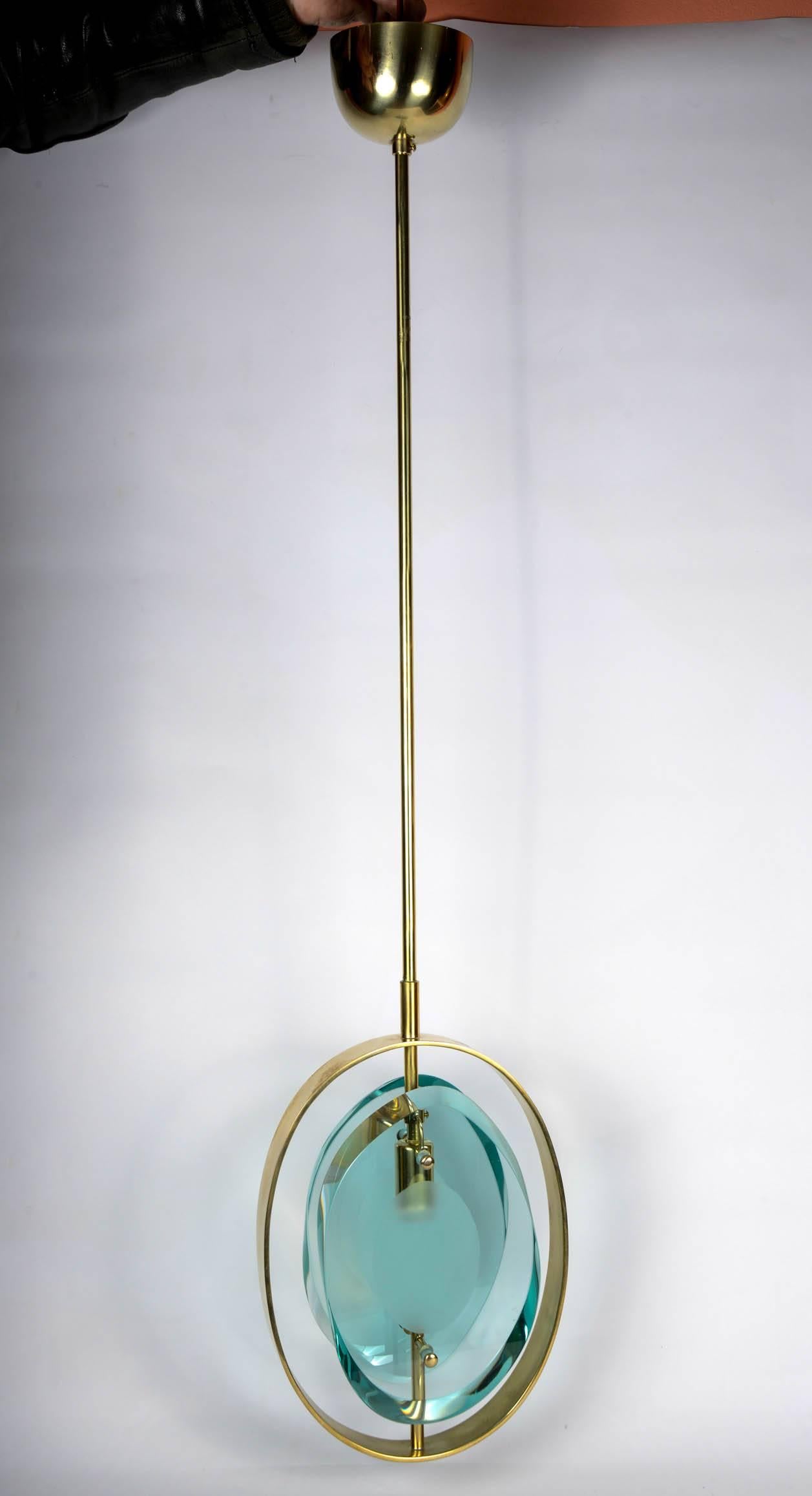 Ceiling light in the style of Max Ingrand (Italy, 1908-1969), model n°1933 for Fontana Arte.

Clear and partially frosted glass, brass.
Possibility of a second one.

Price provided for one.