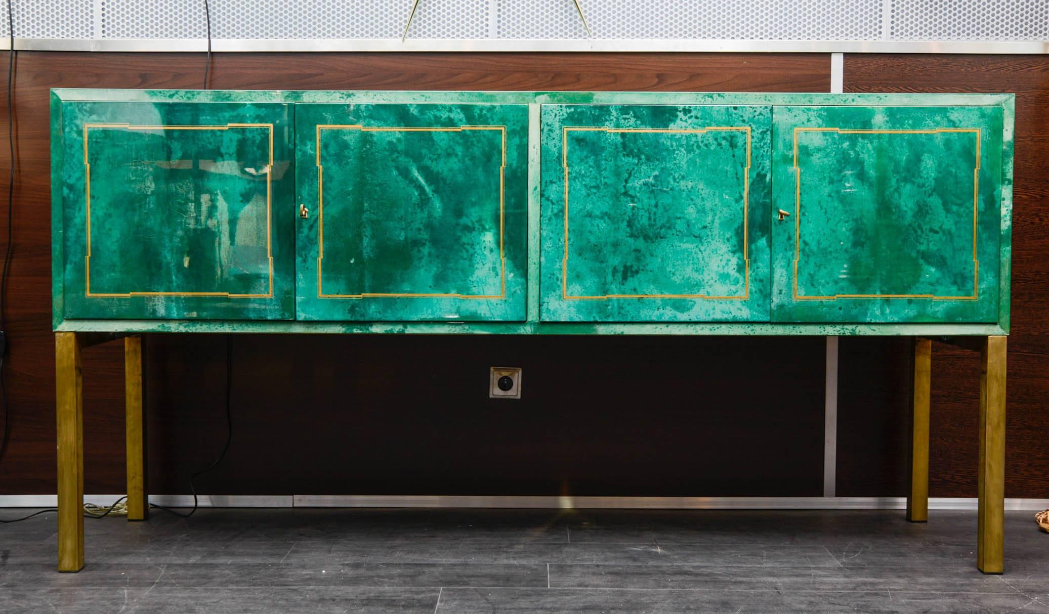Super rare green goatskin cabinet by Aldo Tura.

One drawer is missing. 
See condition report.