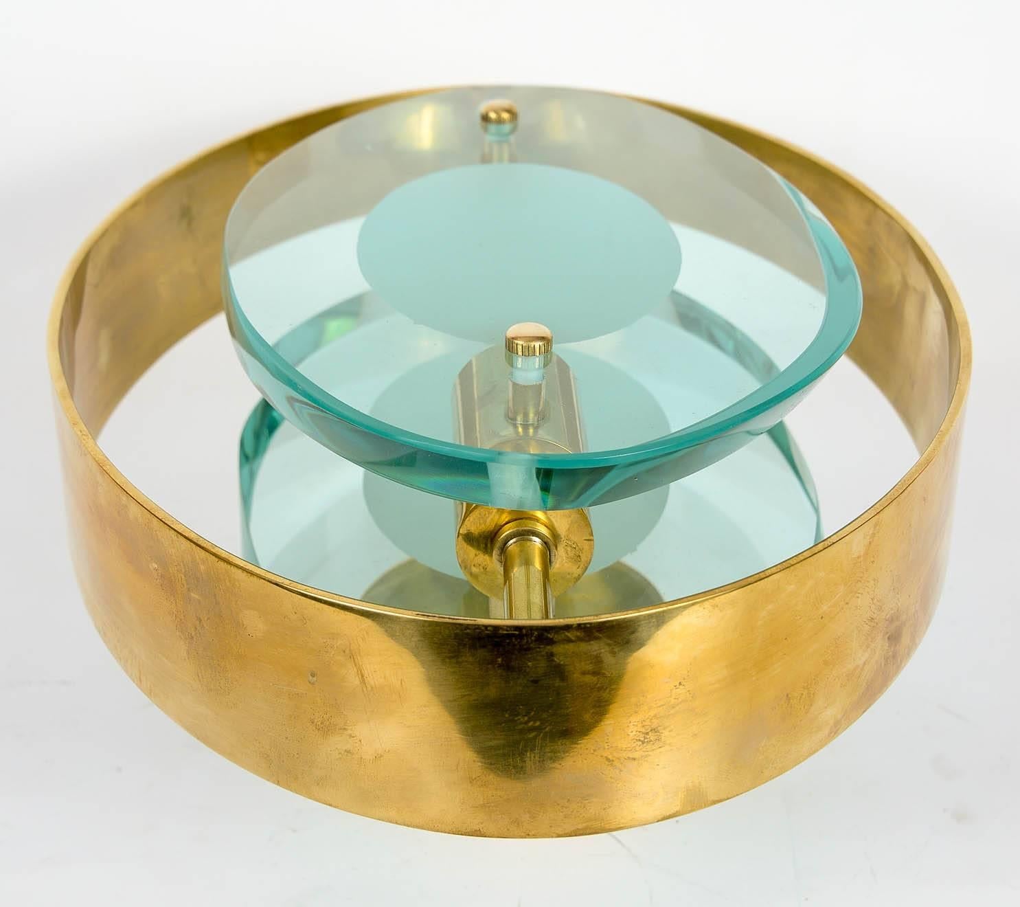 In the style of Fontana Arte, Max Ingrand designed brass and glass wall sconce,
model 2240
Model illustrated in Max Ingrand, Du Verre à Lumière,
page 213.
Mint condition.