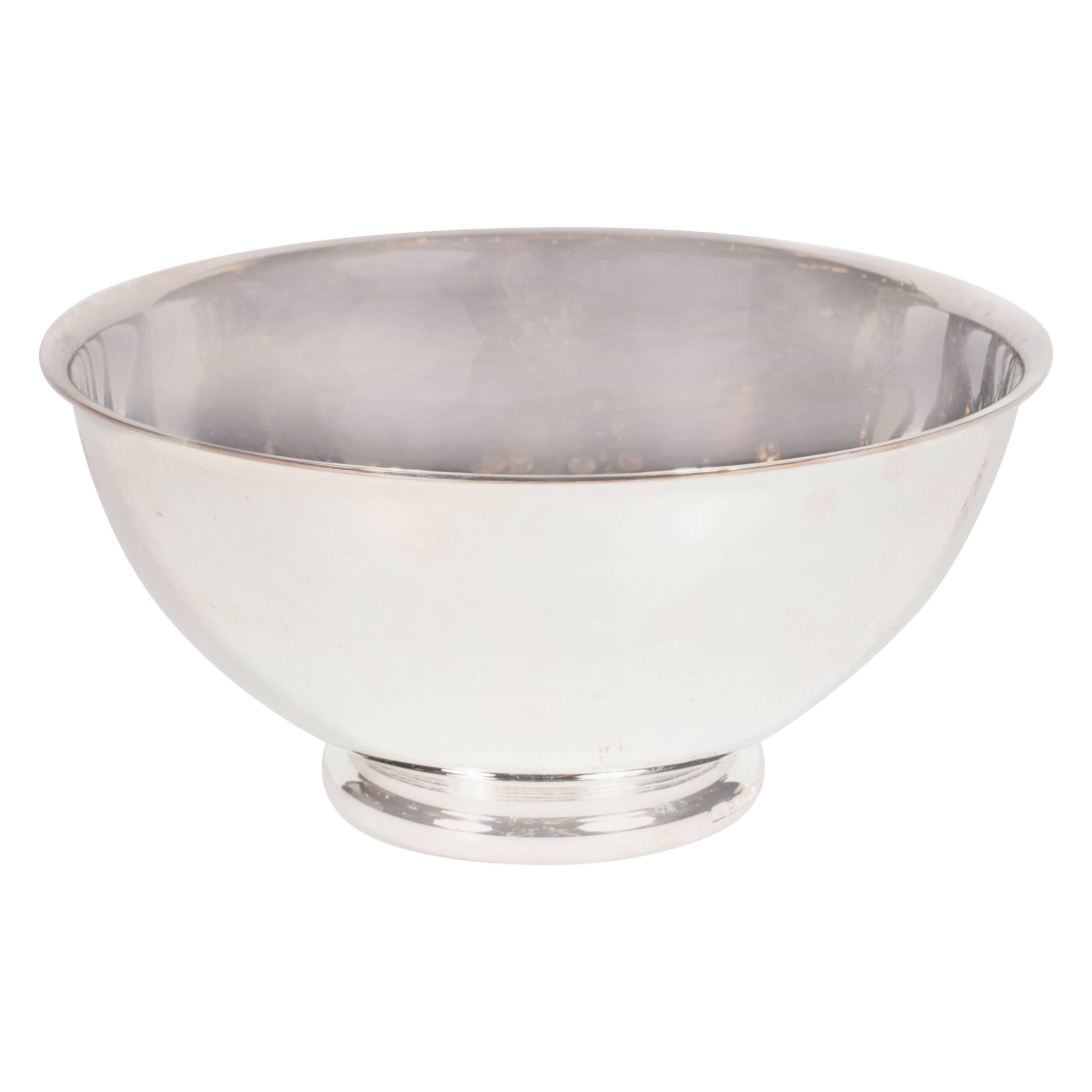 A gorgeous Vertigo series dish or bowl in silver plate with outward curved lip and rounded base signed Christofle. An ideal size for serving olives, candy or simply as an object in itself as a gift. Etched 