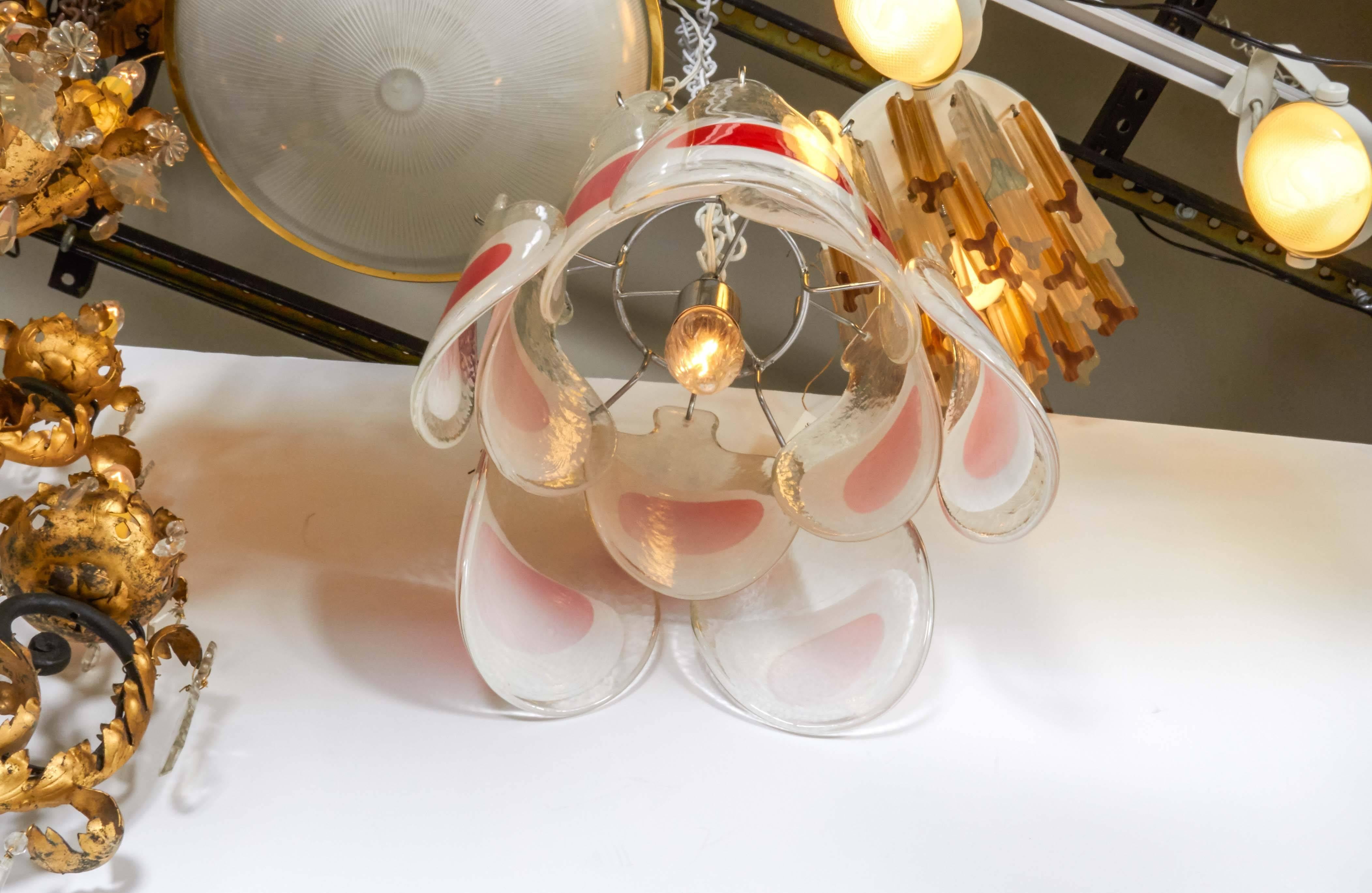 Italian 1970s clear, white and orange red blown disk chandelier by Mazzega of Italy.
Dimensions: 13