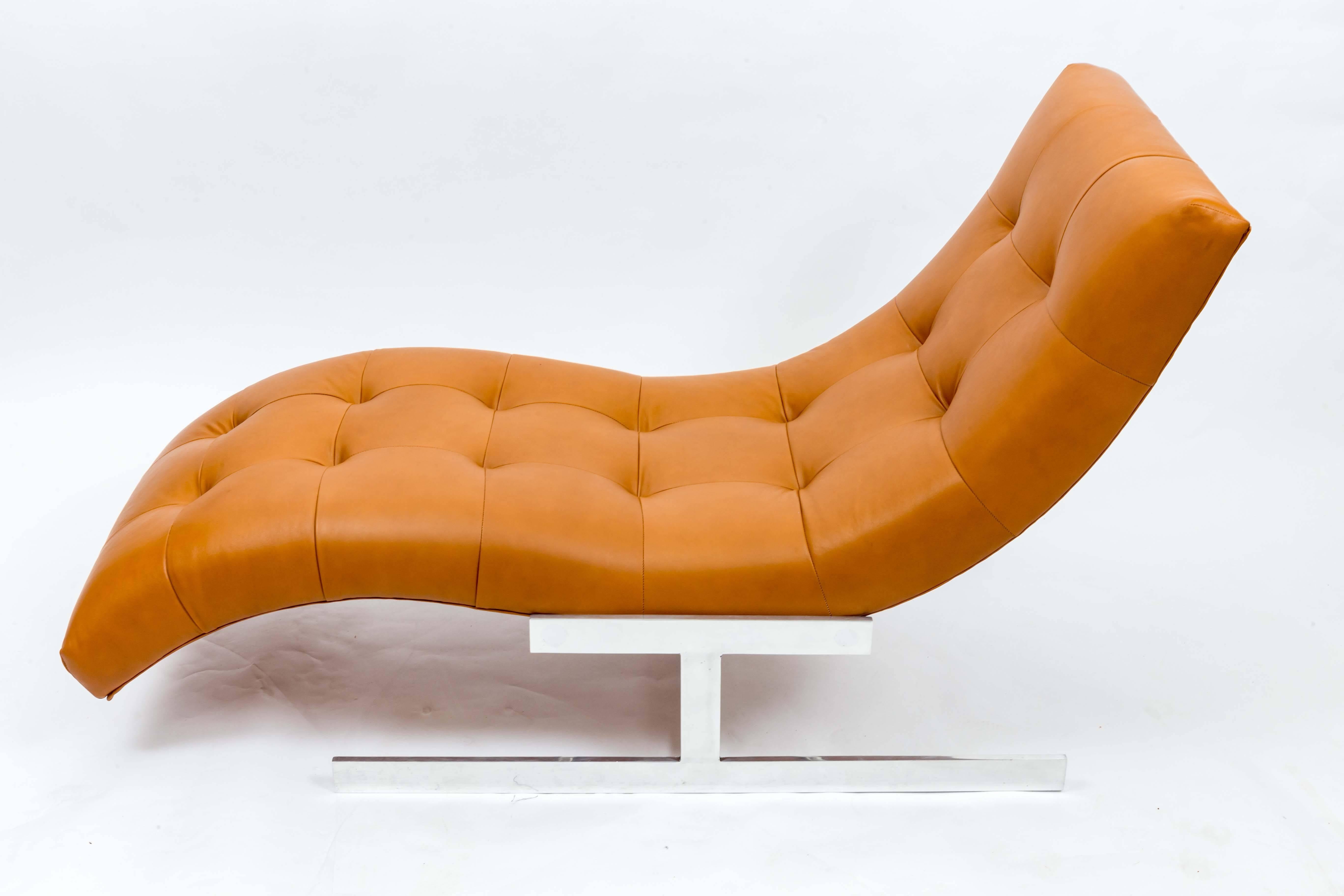 In the style of Milo Baughman, Newly re-upholstered in sumptuous saddle leather.