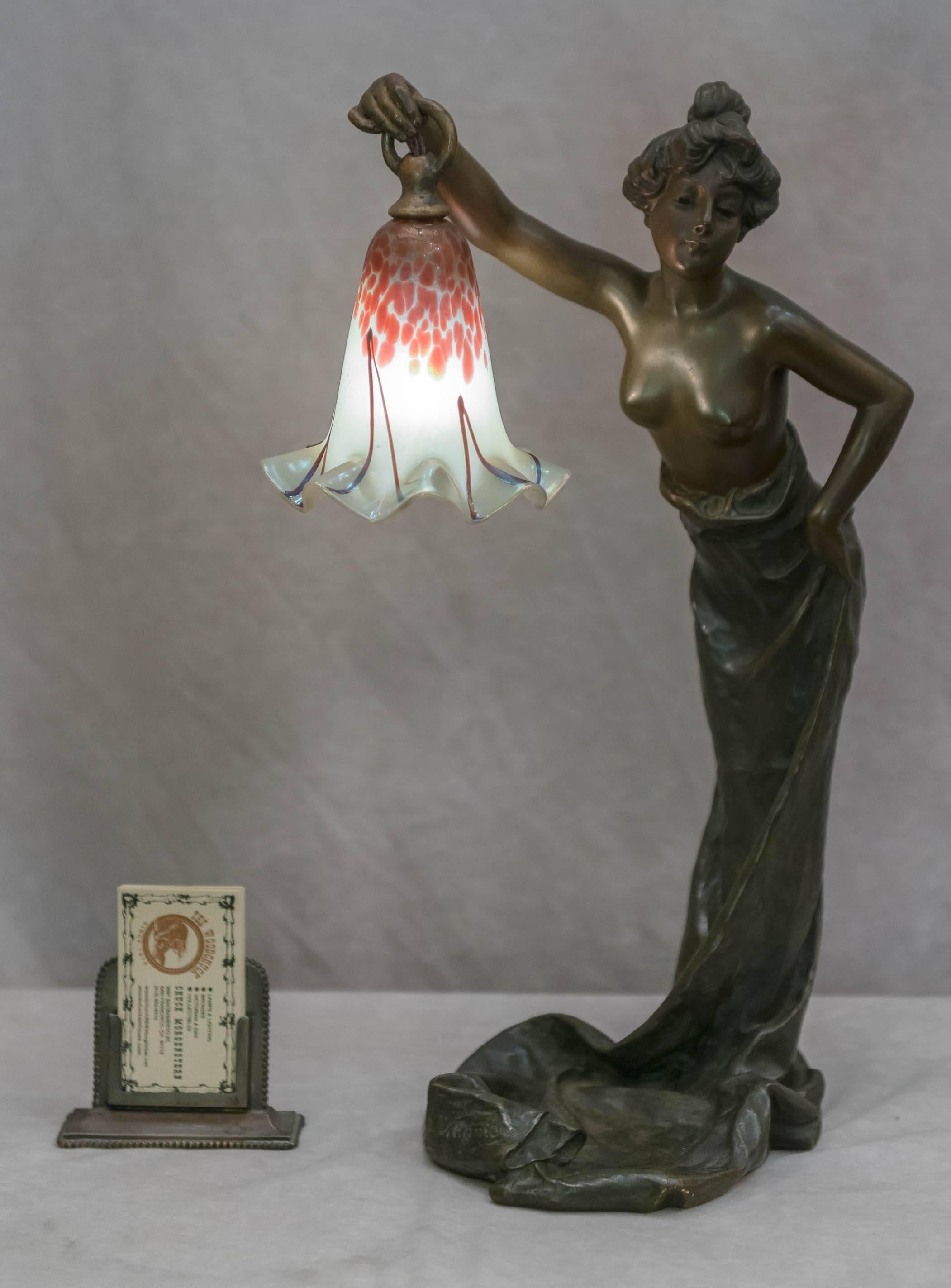 We are always looking for good Art Nouveau bronzes, especially lamps with nudes. We have it all here. Signed by the well regarded French artist Villanis and having a beautiful handblown period glass shade. We would not sell this one if we did not