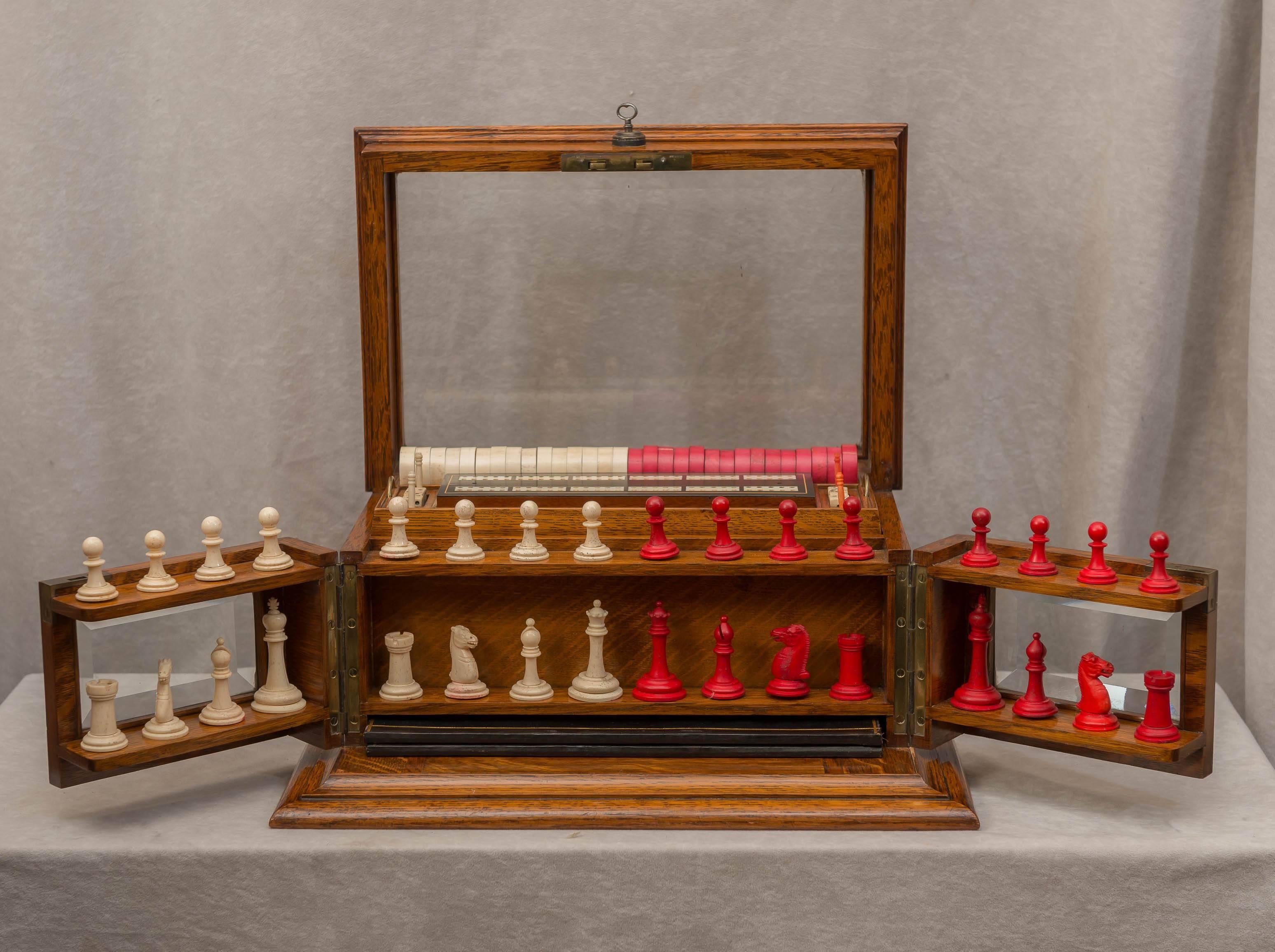 This is easily one of the most wonderful antique items I have ever offered. Starting with a handsome Edwardian oak box with beveled glass, and each time you search through other games become exposed. As we say in our description, it has chess,