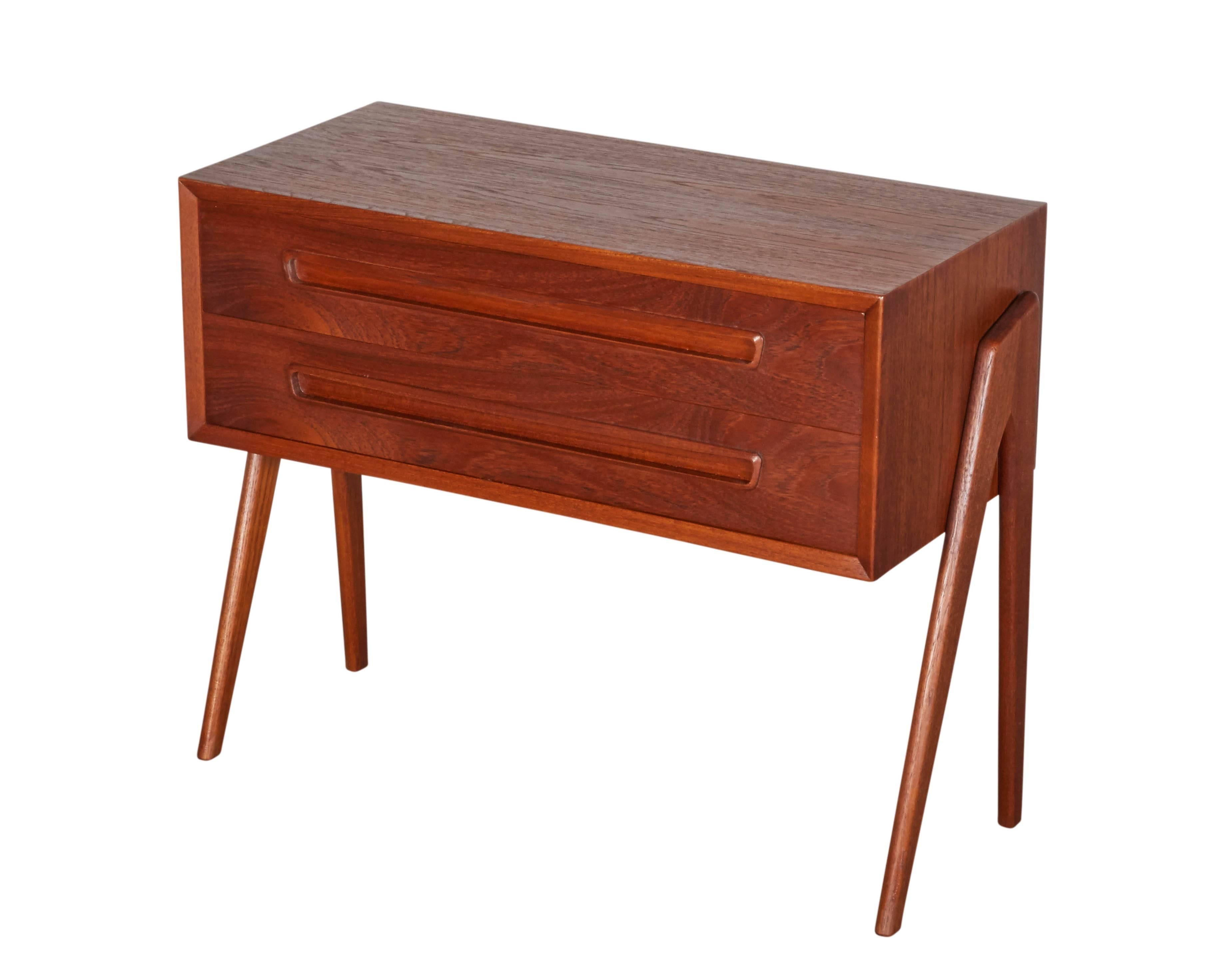 Vintage 1960s Danish Nightstands

This pair of mid century bedside tables are in excellent condition. They can also be used as living room end tables. Ready for pick up, delivery, or shipping anywhere in the world.