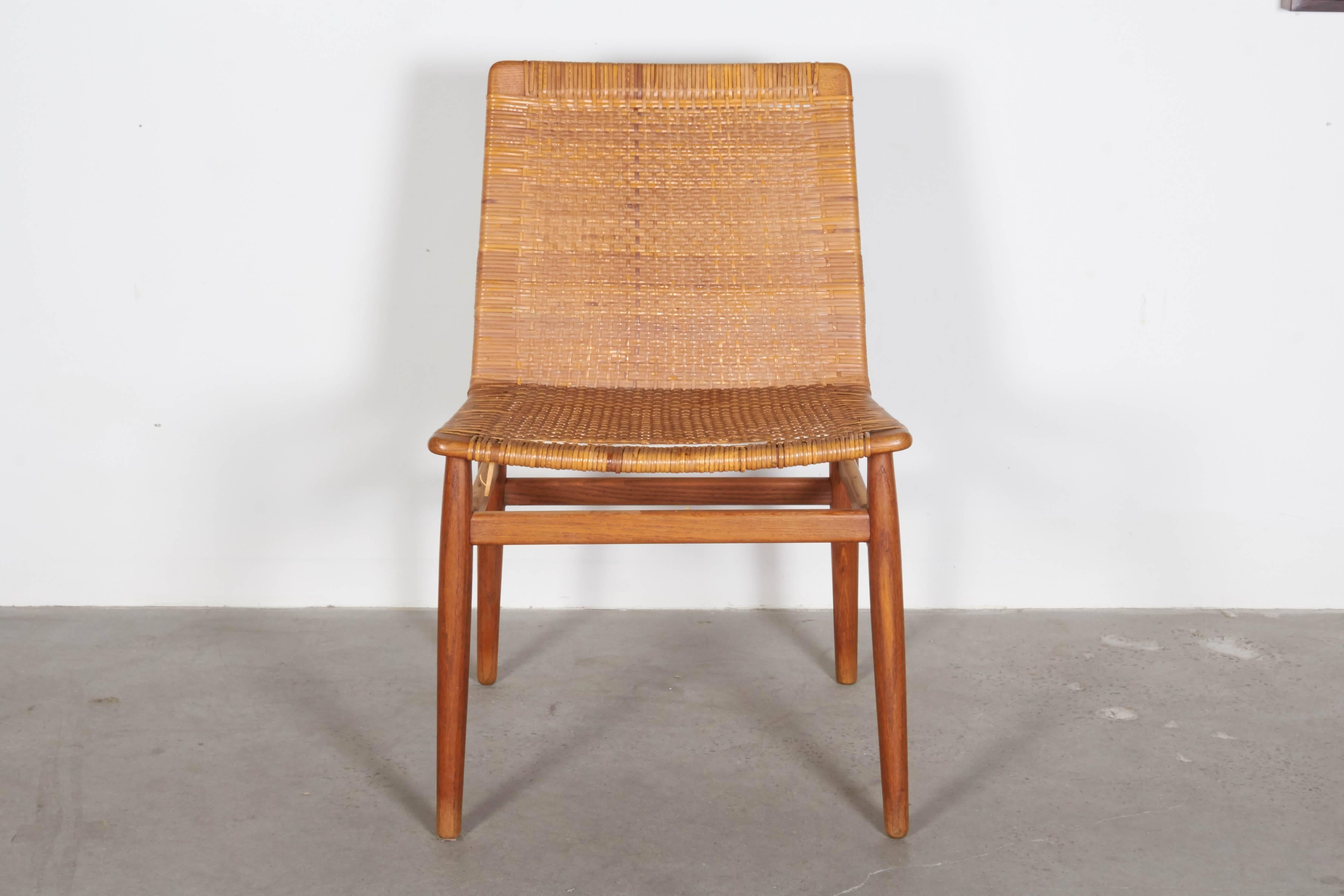 Vintage 1950s Teak Side Chair

This Danish Desk Chair is in vintage condition. The Bamboo weave, although broken in some areas (see pics 7 & 8) is still very strong and can hold a person very comfortably. Ready for pick up, delivery, or shipping
