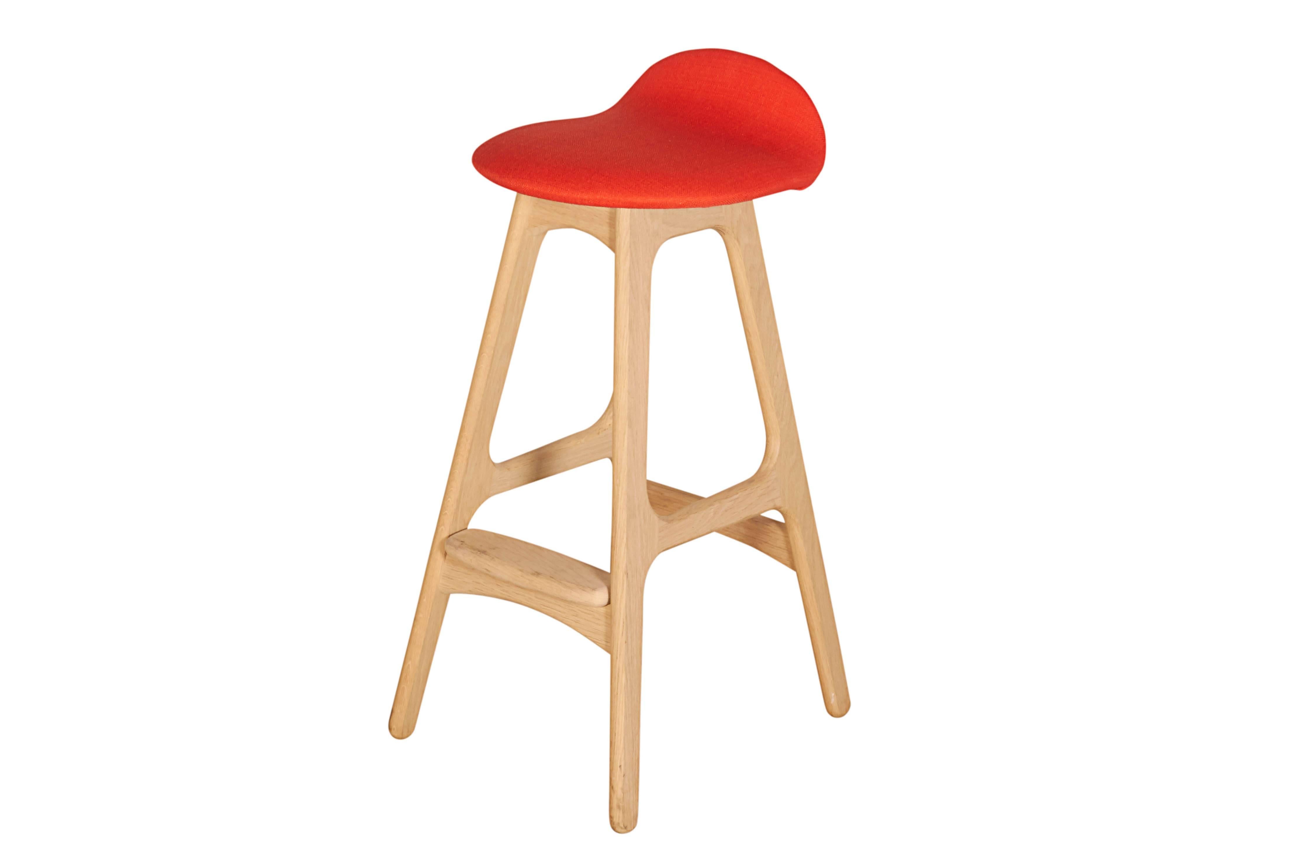 Orange Counter Stools by Erik Buch, Set of Three

This set of oak bar stools are in excellent condition, and have been newly upholstered in electric orange. The back is surprisingly supportive so sit up straight comfortably. We found a few so let us