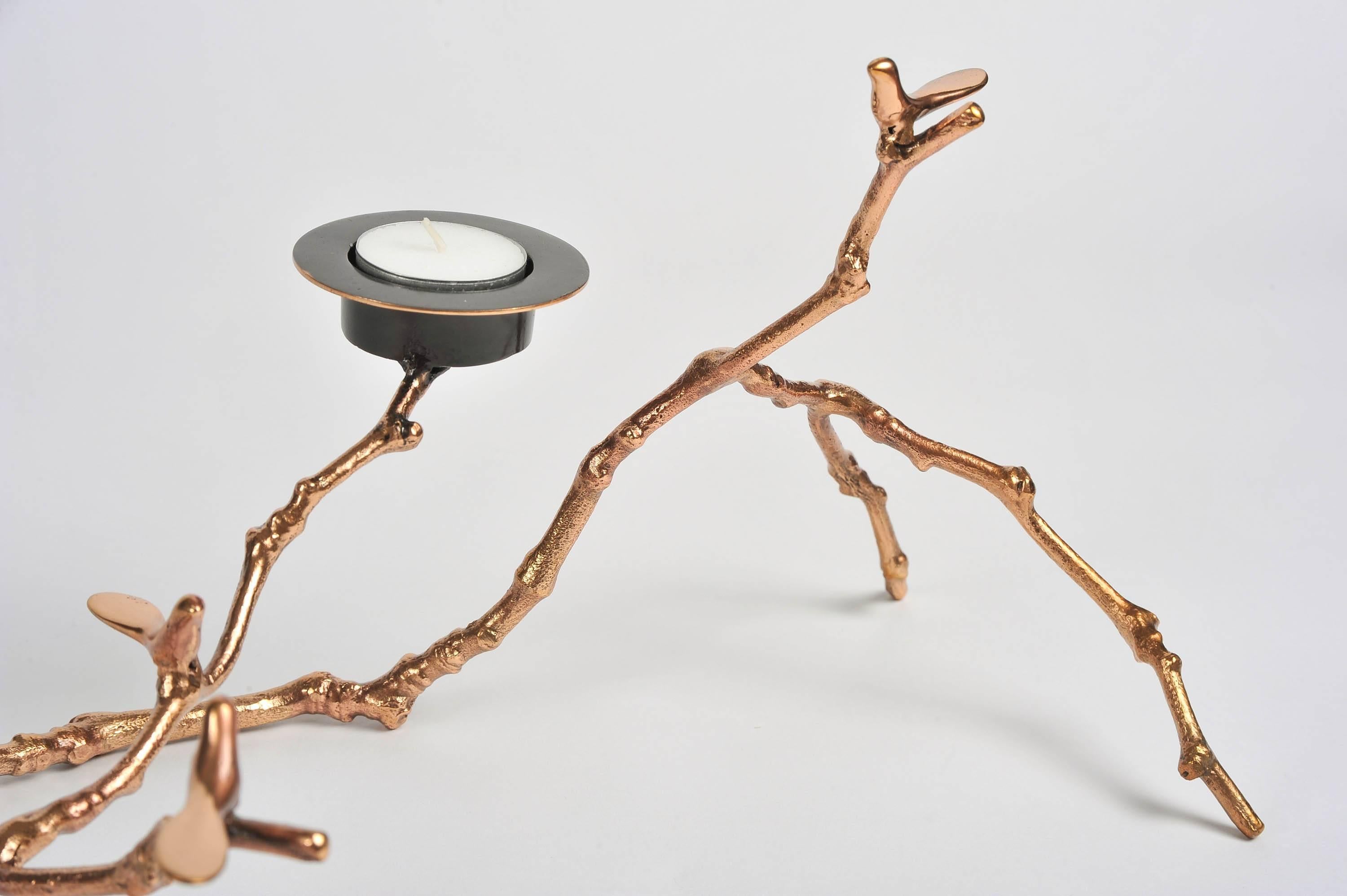 Handmade cast bronze. Slender magnolia twig with birds and tea-light holder.