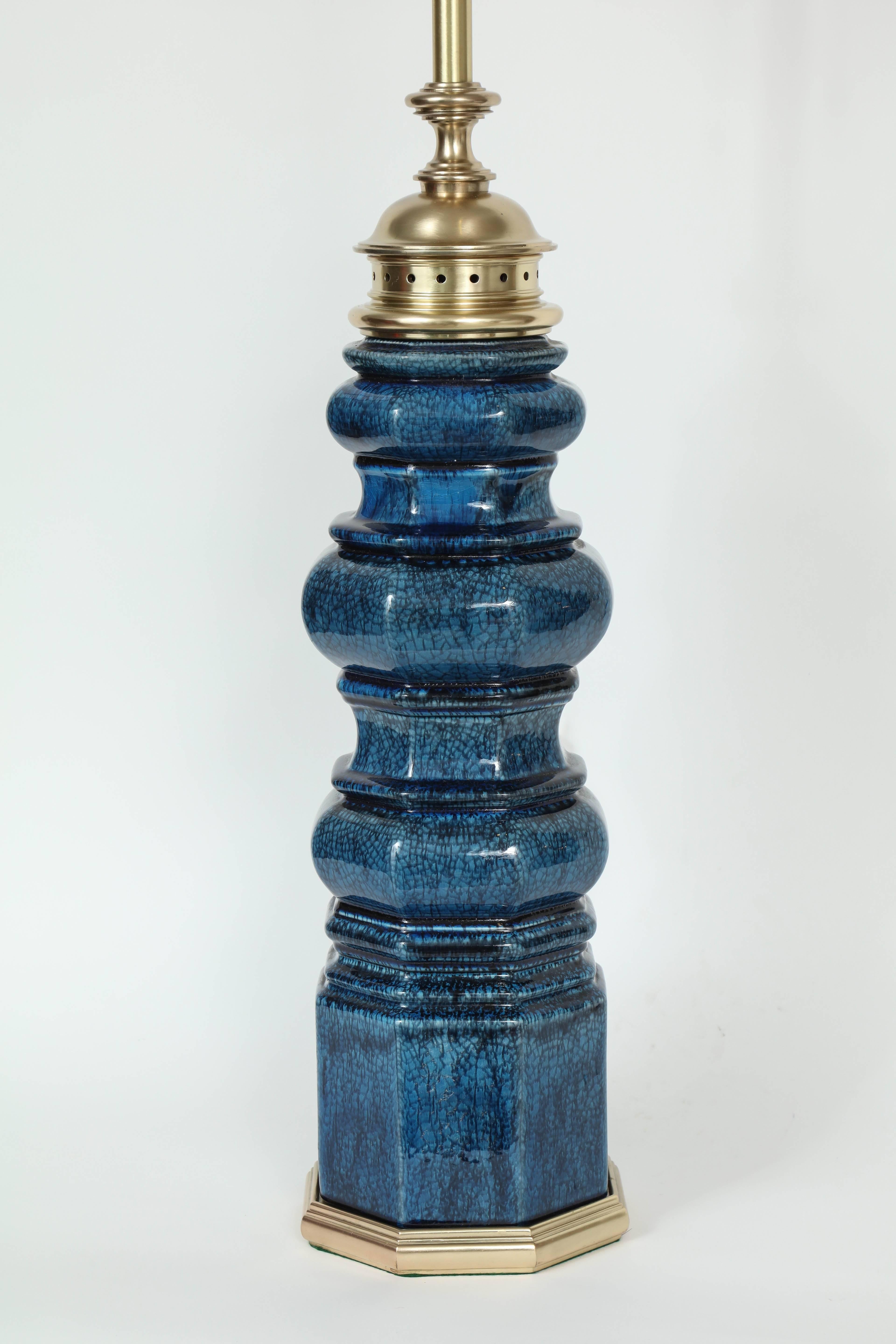 Pair of large blue crackle glazed ceramic lamps with satin brass hardware. Rewired for use in USA.