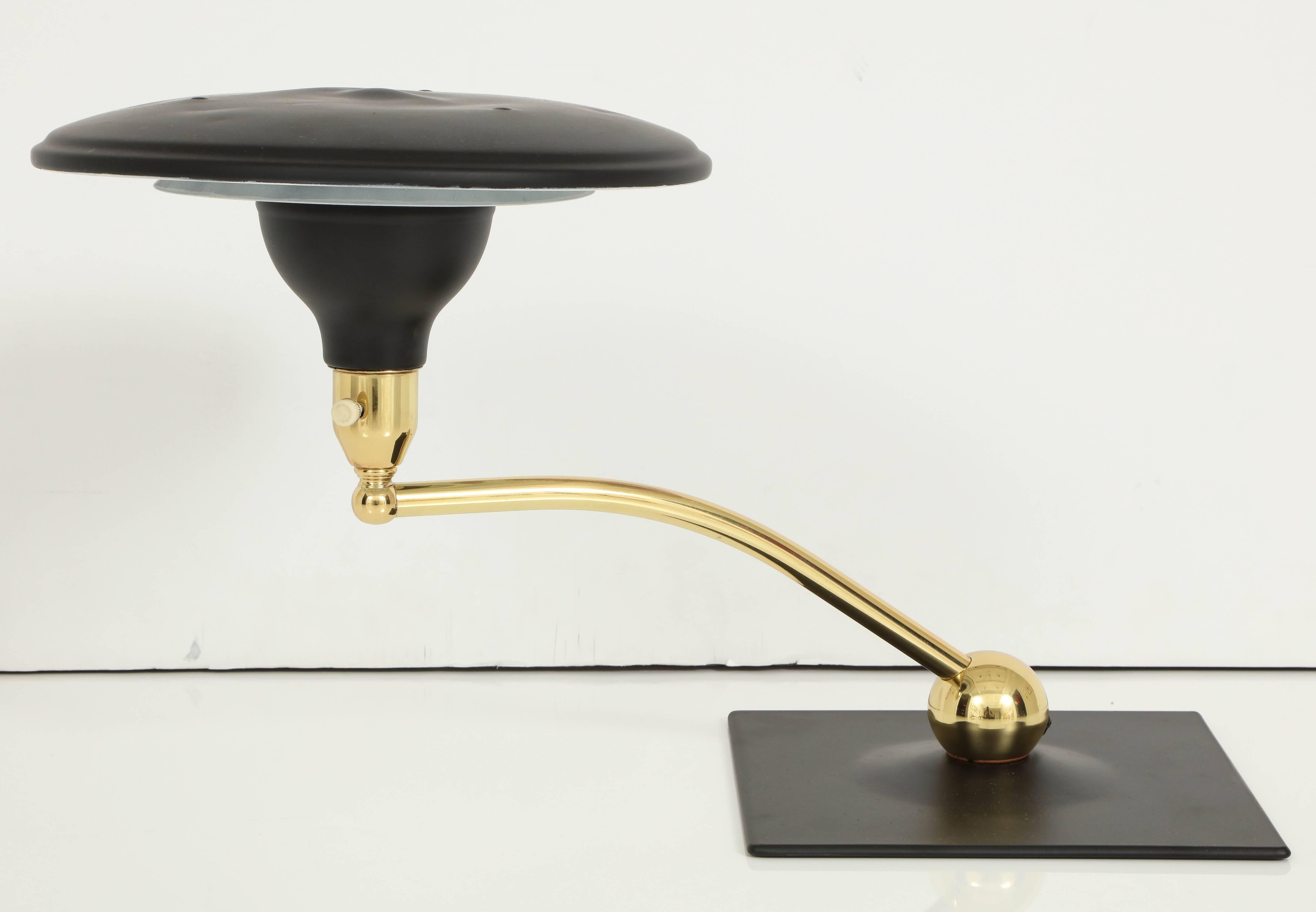 1930s streamline cantilever design desk lamp with restored flat black and polished brass finish.