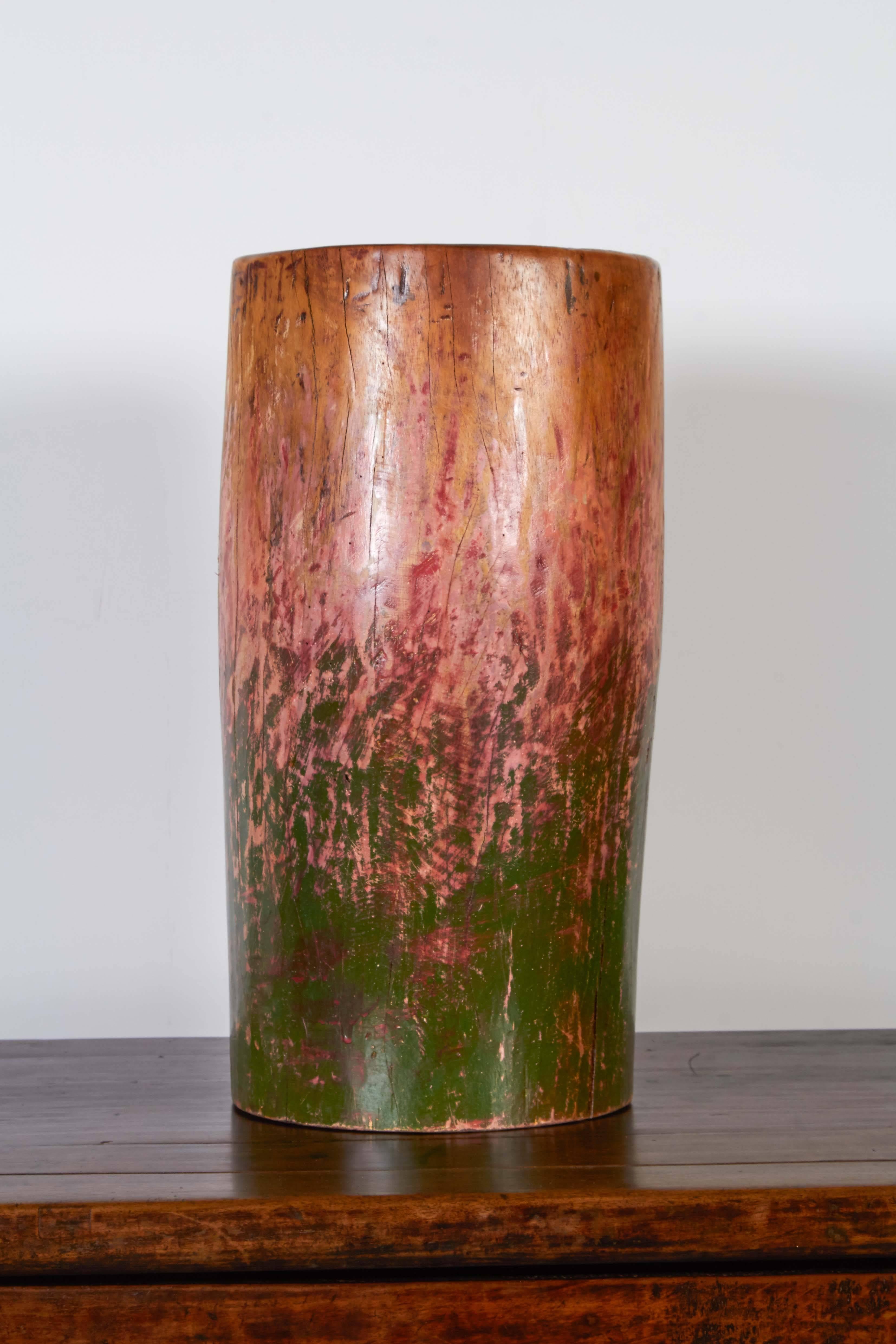Gracefully shaped and warmly colored vase made from vintage drum base carved from a single piece of teakwood. From Java, Indonesia, circa 1920.
M2016.